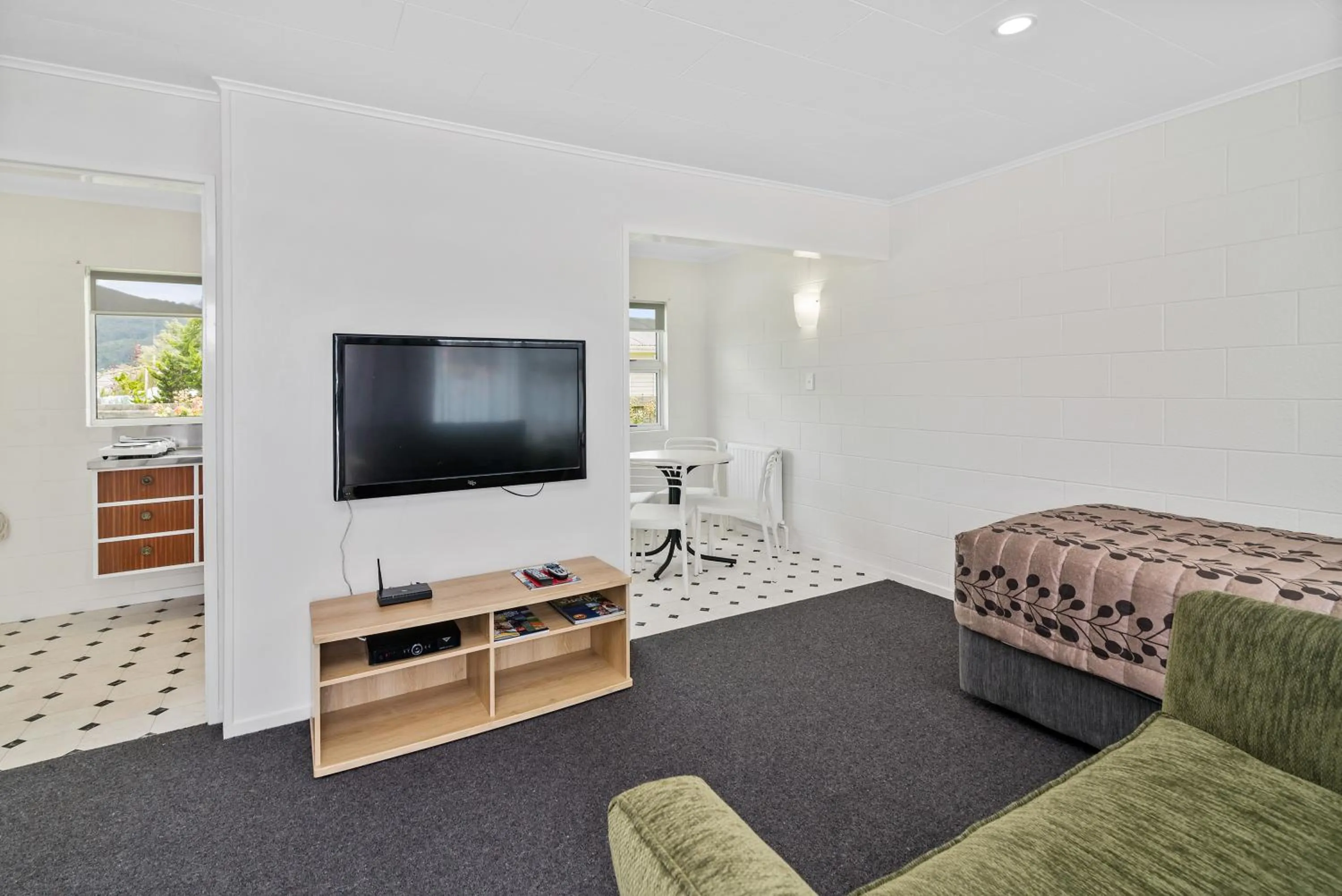 Living room, Bed in ASURE Cleveland Rotorua