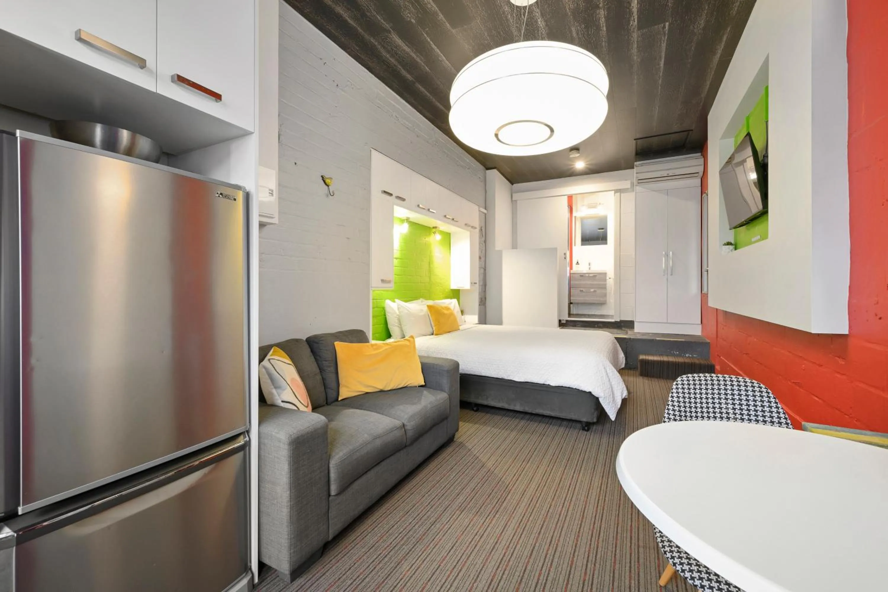 Bed in Burnie City Apartments