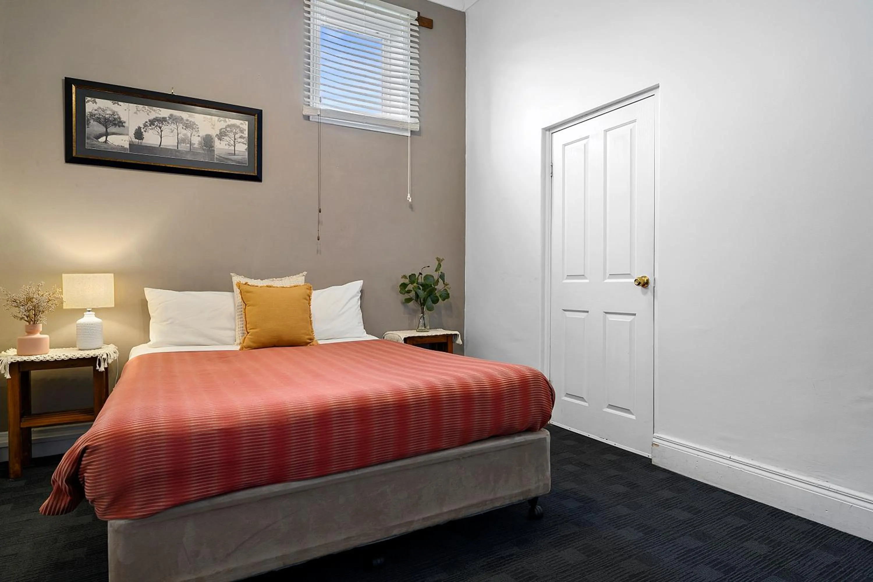 Bed in Burnie City Apartments