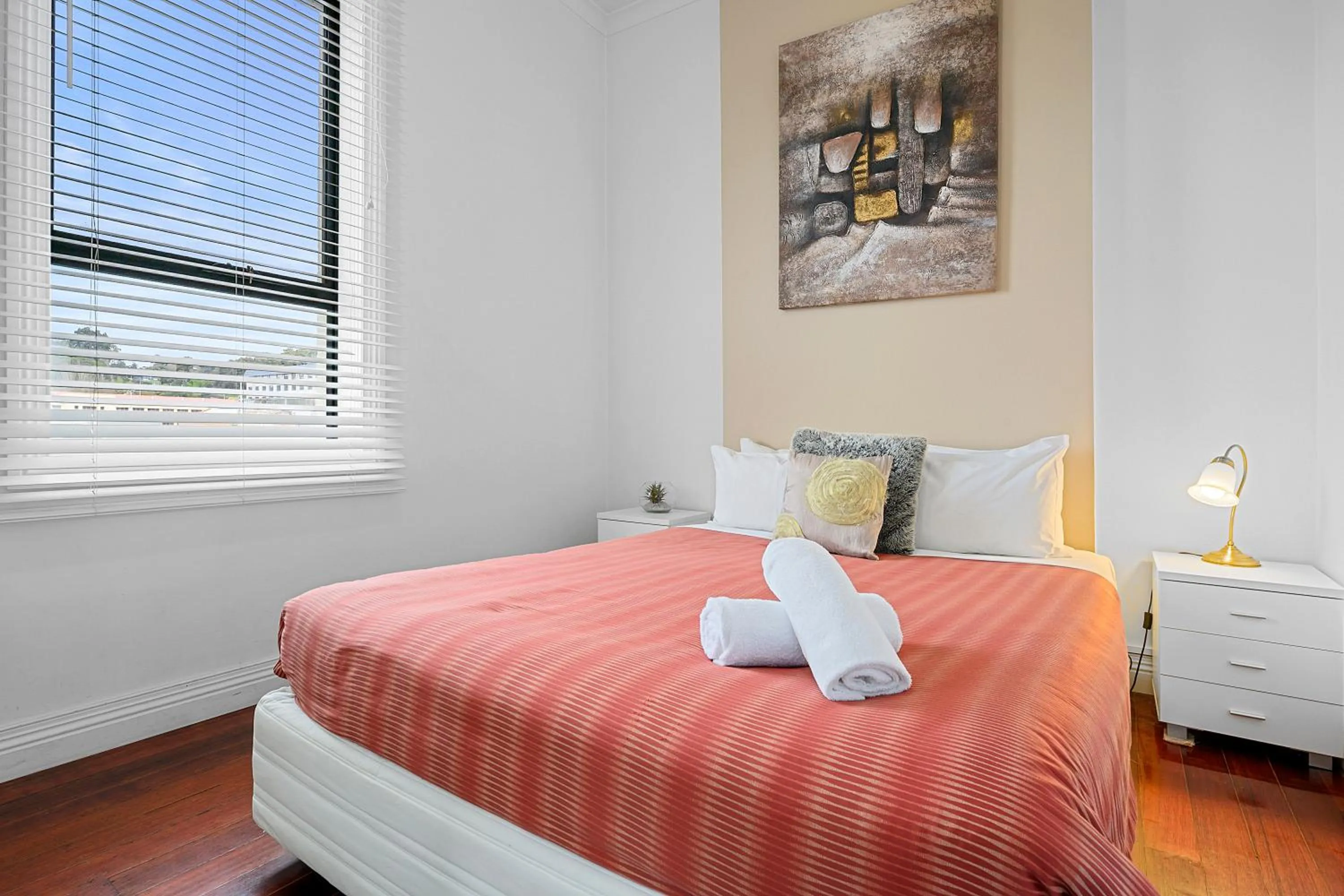 Bed in Burnie City Apartments