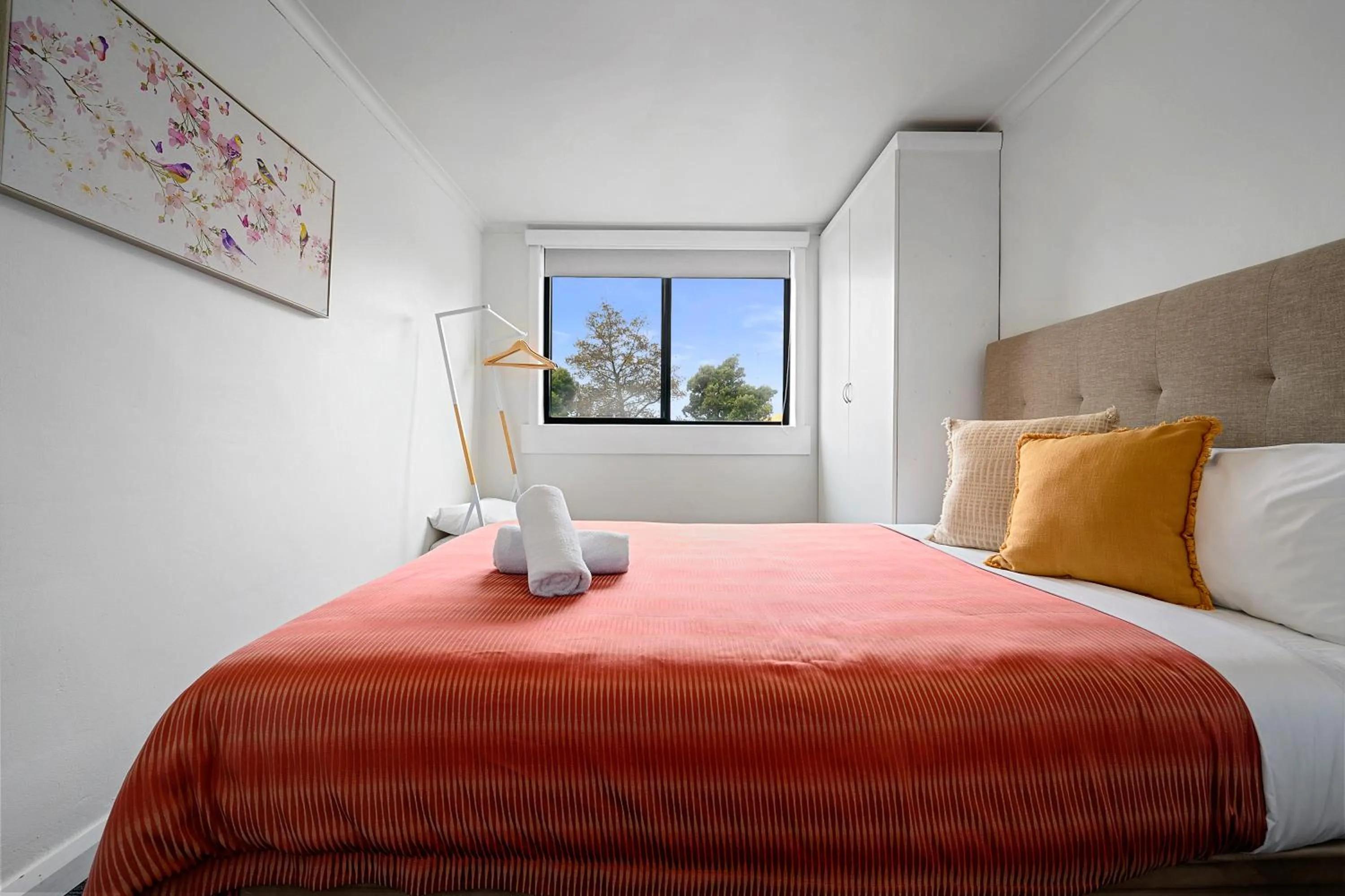 Bed in Burnie City Apartments