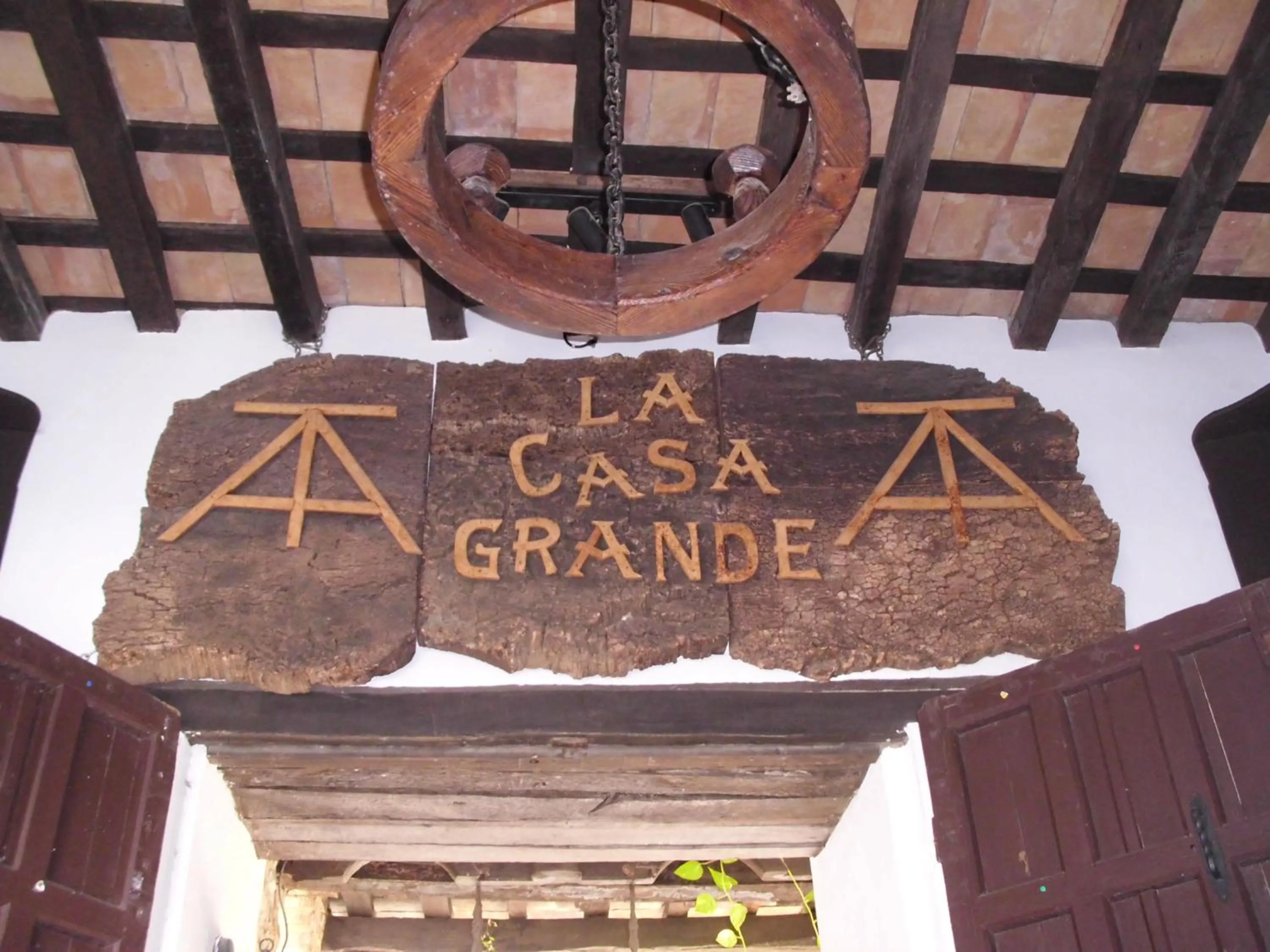 Property logo or sign in Posada La Casa Grande