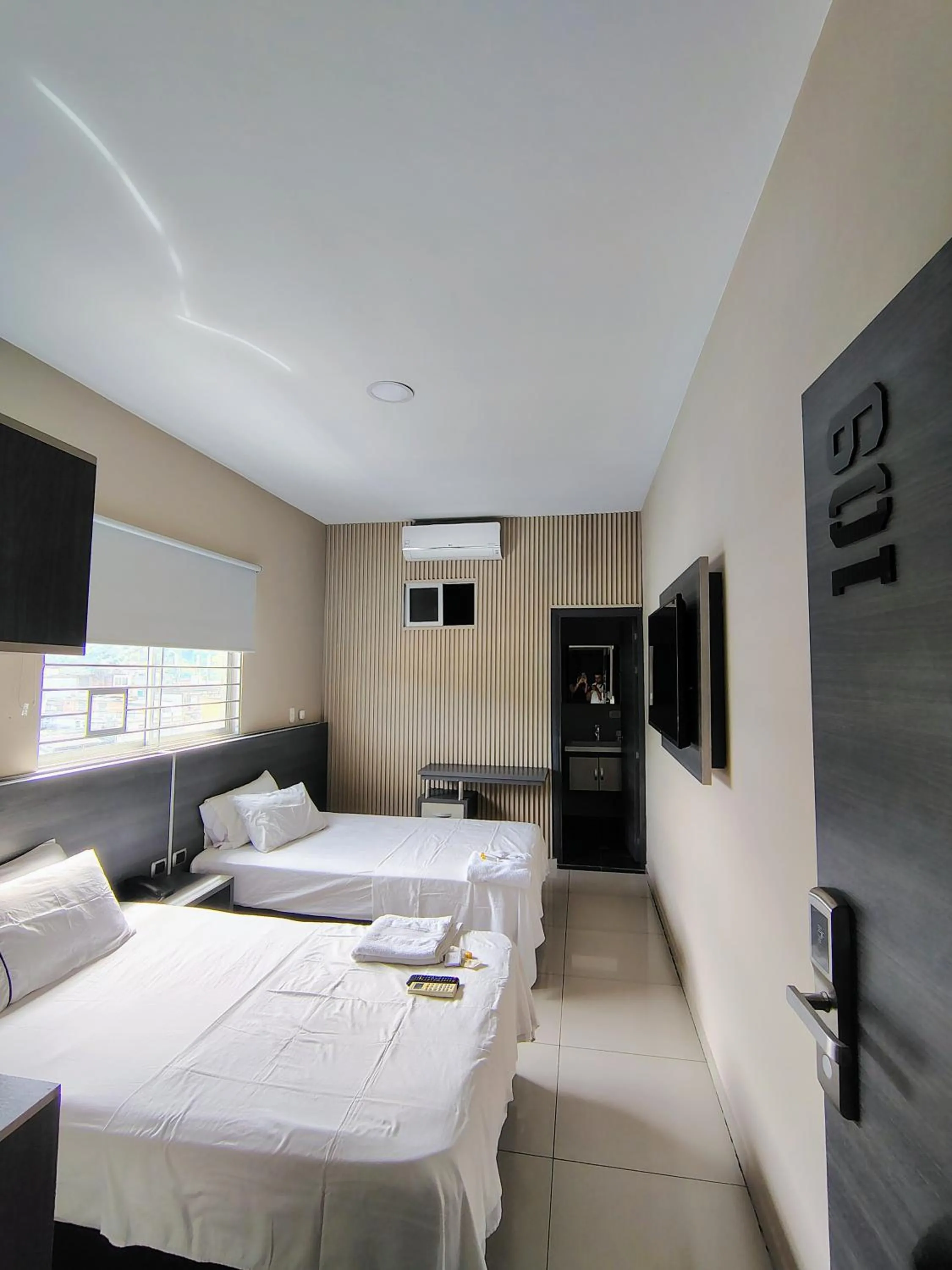 Bed in Hotel Doral Inn