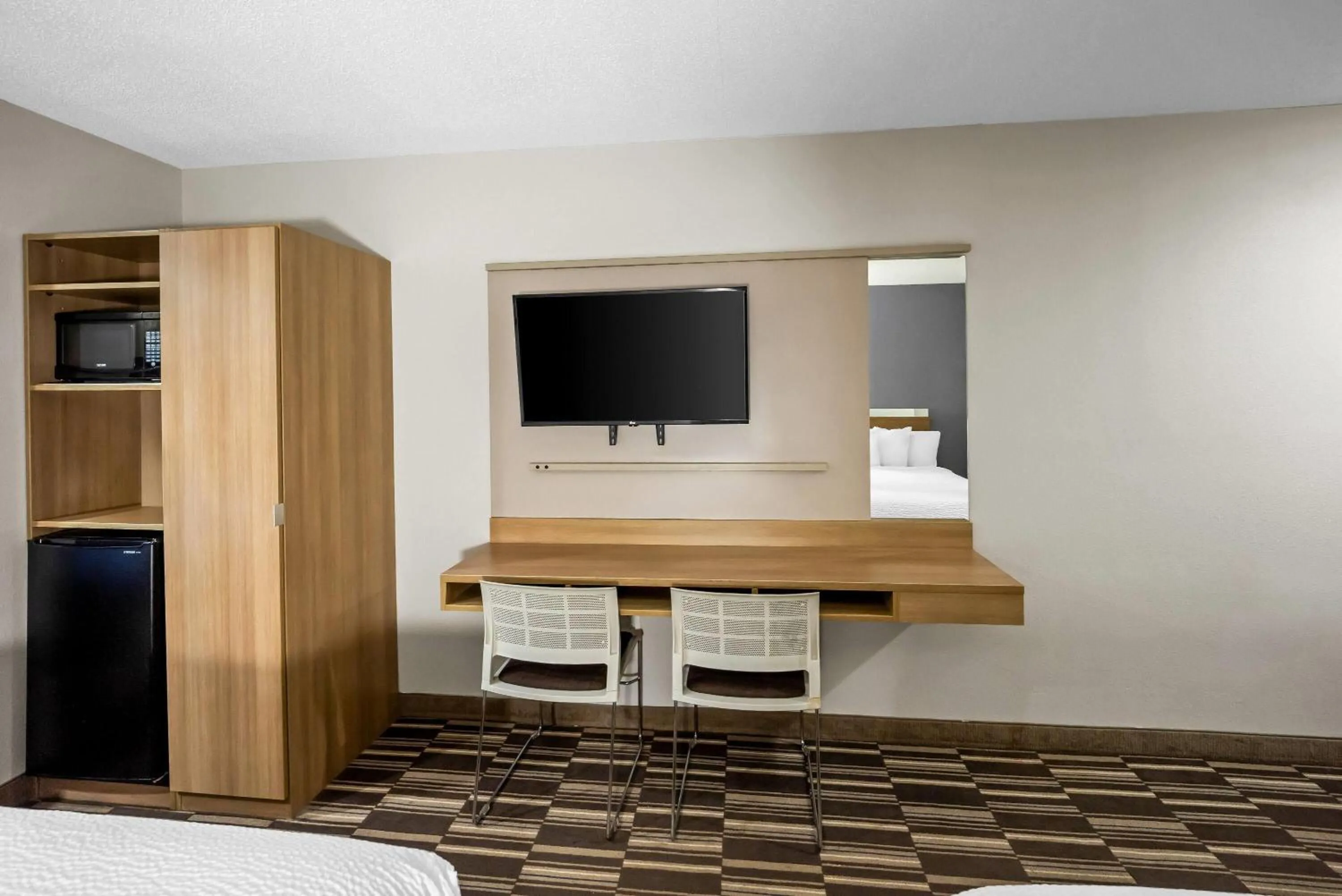 Bed in Microtel Inn by Wyndham Greensboro