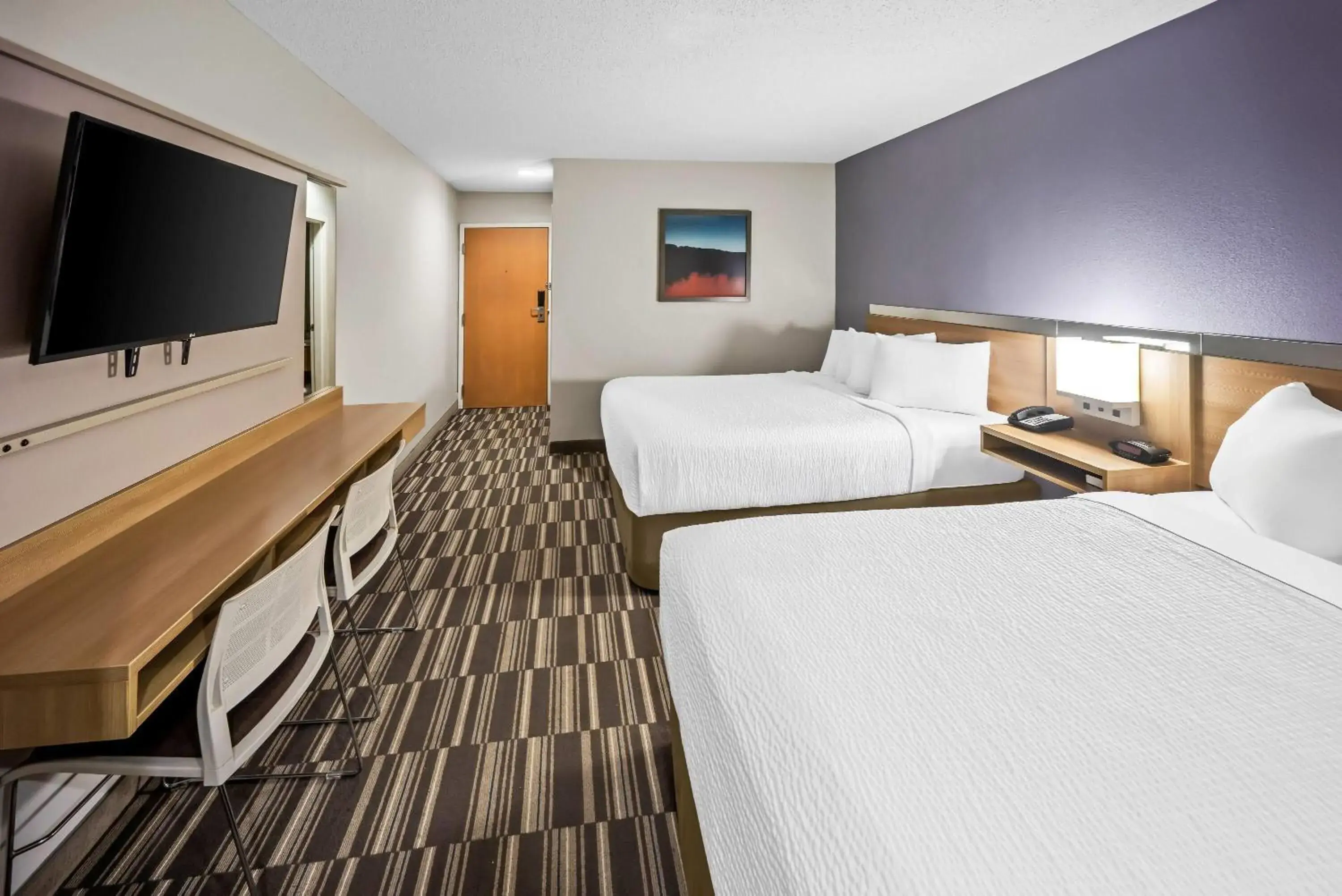 Bed in Microtel Inn by Wyndham Greensboro Bed in Microtel Inn by Wyndham Greensboro