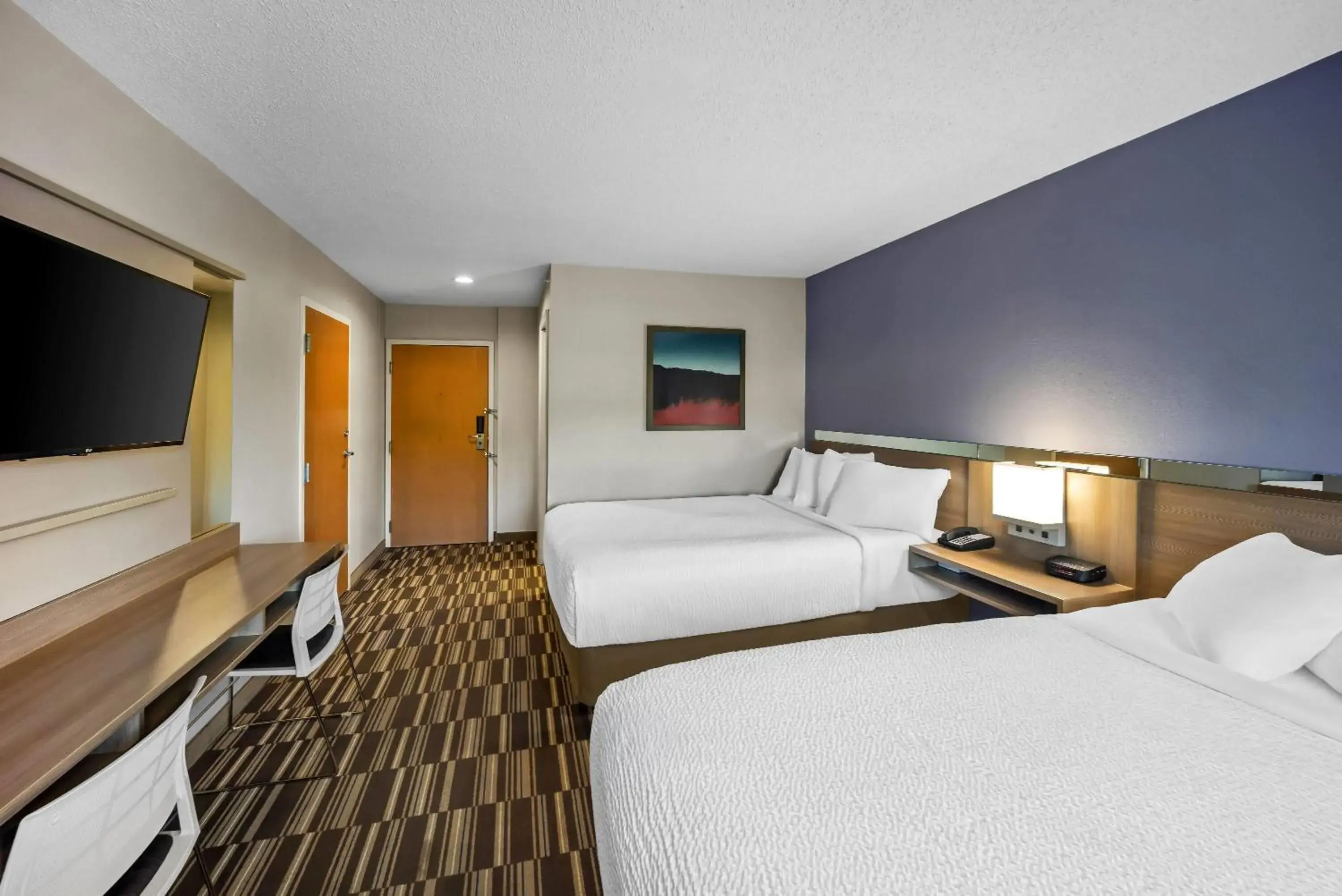 Bed in Microtel Inn by Wyndham Greensboro Bed in Microtel Inn by Wyndham Greensboro