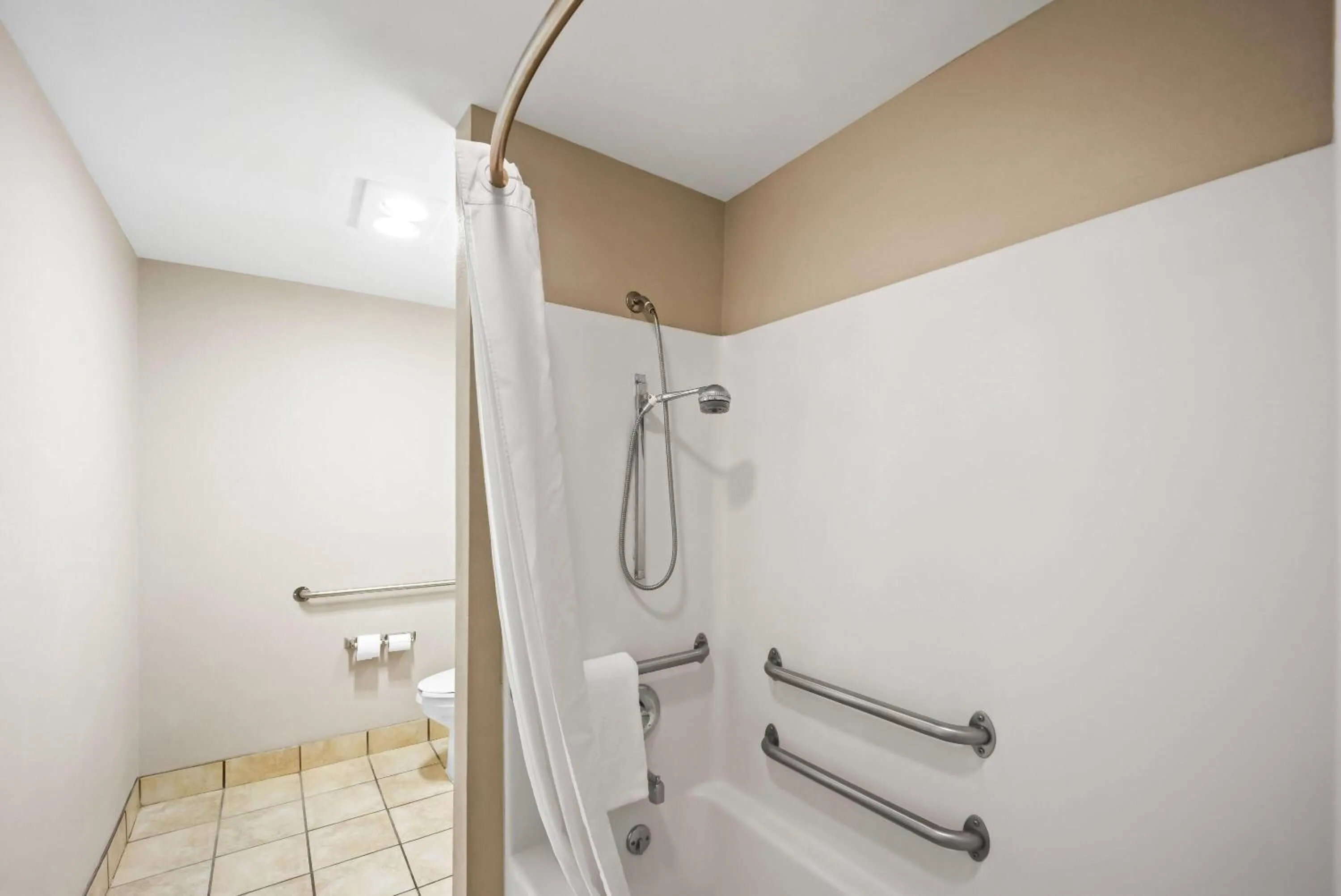 Bathroom in Microtel Inn by Wyndham Greensboro