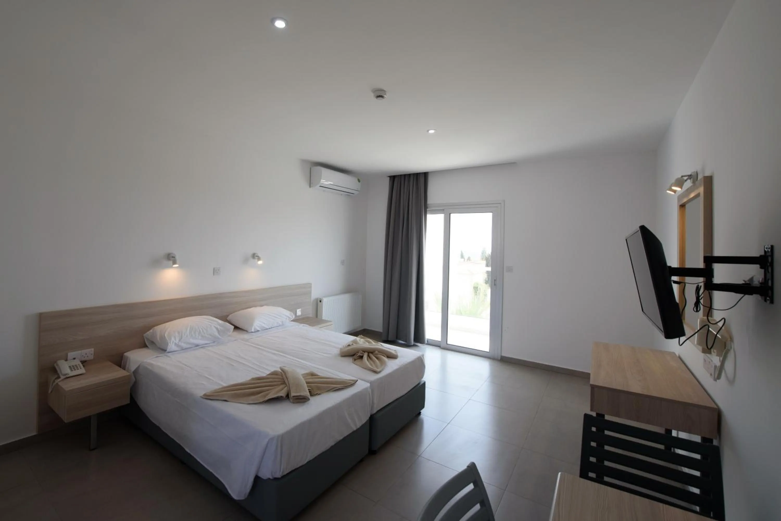 Bed in Evabelle Napa Hotel Apartments