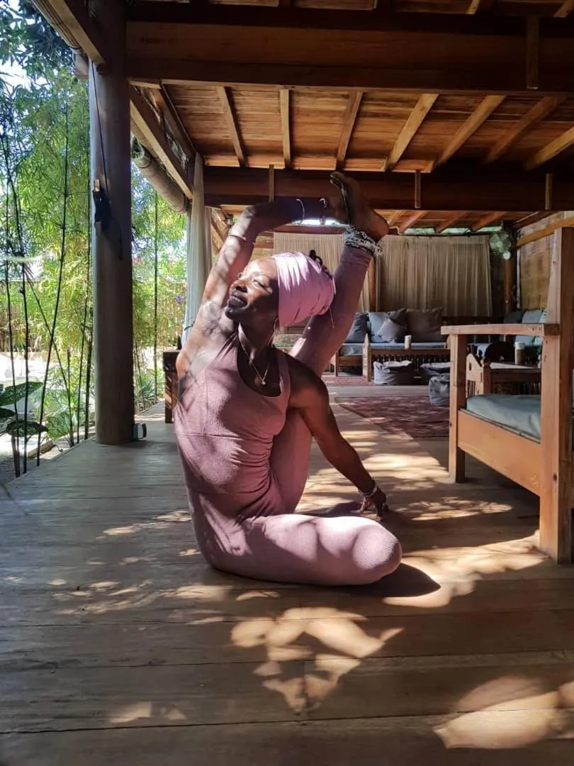 People in Flowers & Fire Yoga Garden