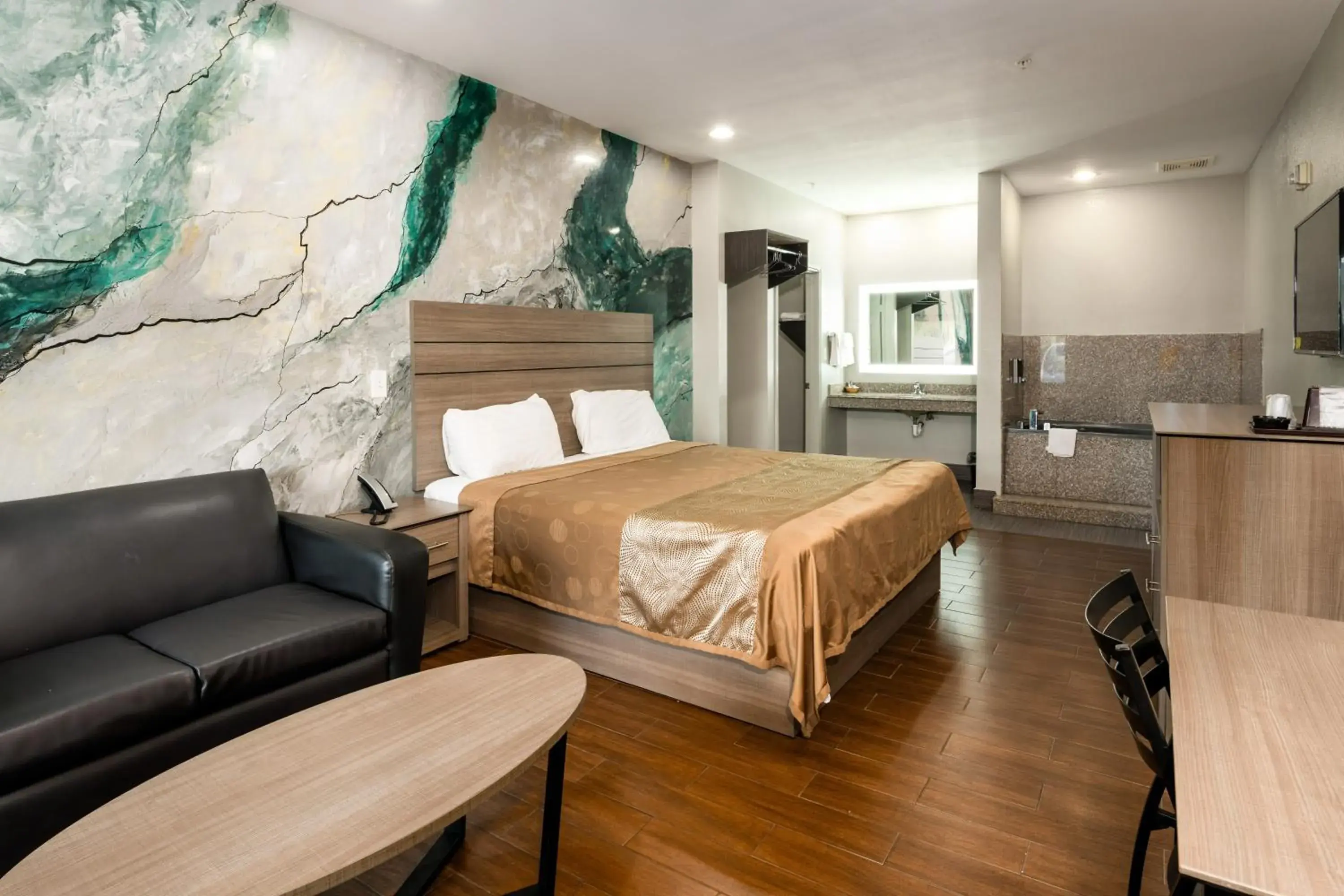 Bedroom, Bed in Moonlight Suites - Houston/George Bush Int'l Airport Bedroom, Bed in Moonlight Suites - Houston/George Bush Int'l Airport