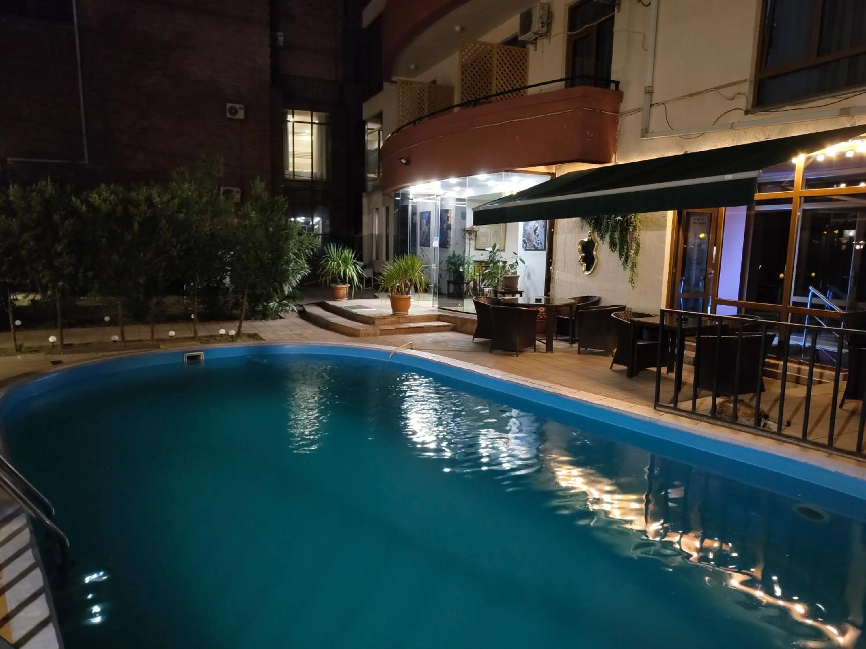 Swimming pool in Sani Apart Hotel