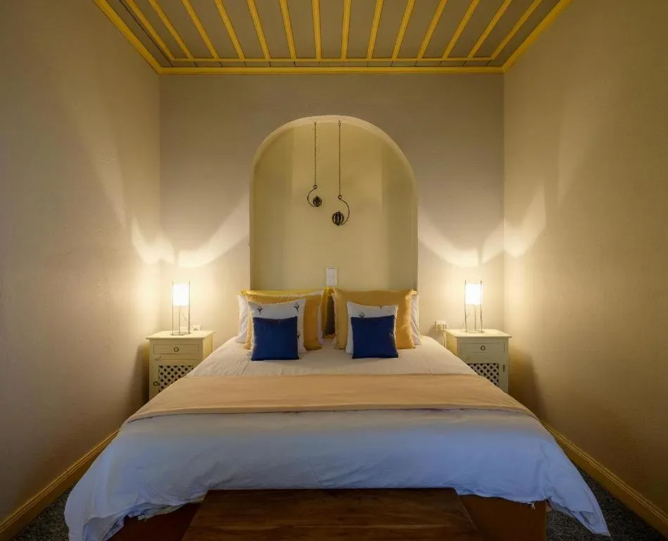 Bed in Kyriaki Guesthouse & Suites
