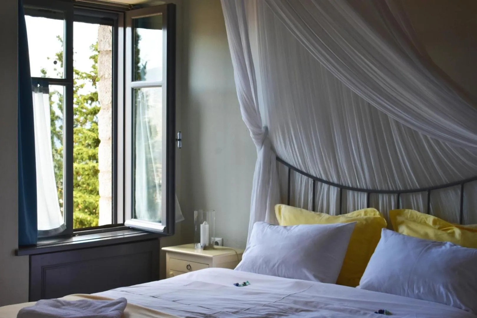 Bed in Kyriaki Guesthouse & Suites