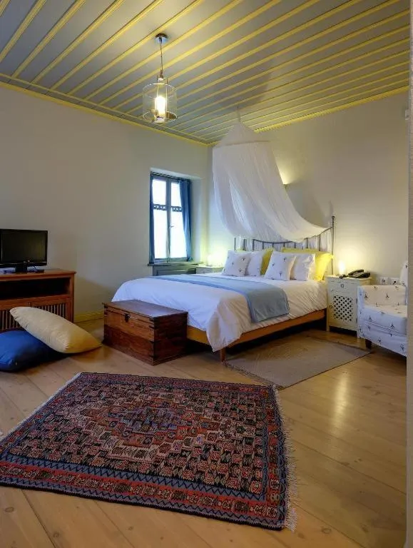 Bed in Kyriaki Guesthouse & Suites