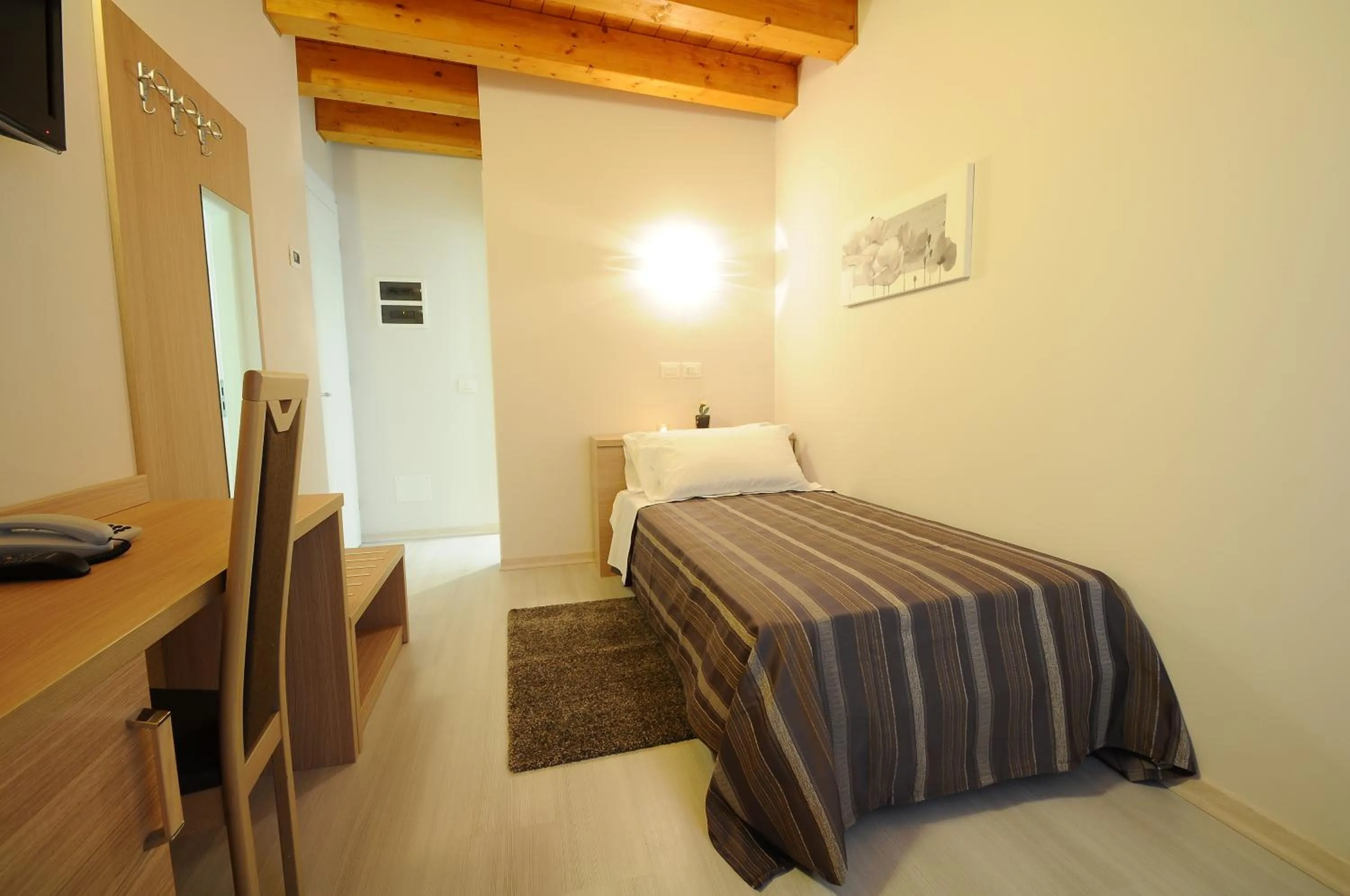 Photo of the whole room, Bed in Albergo Leon Bianco Gonars