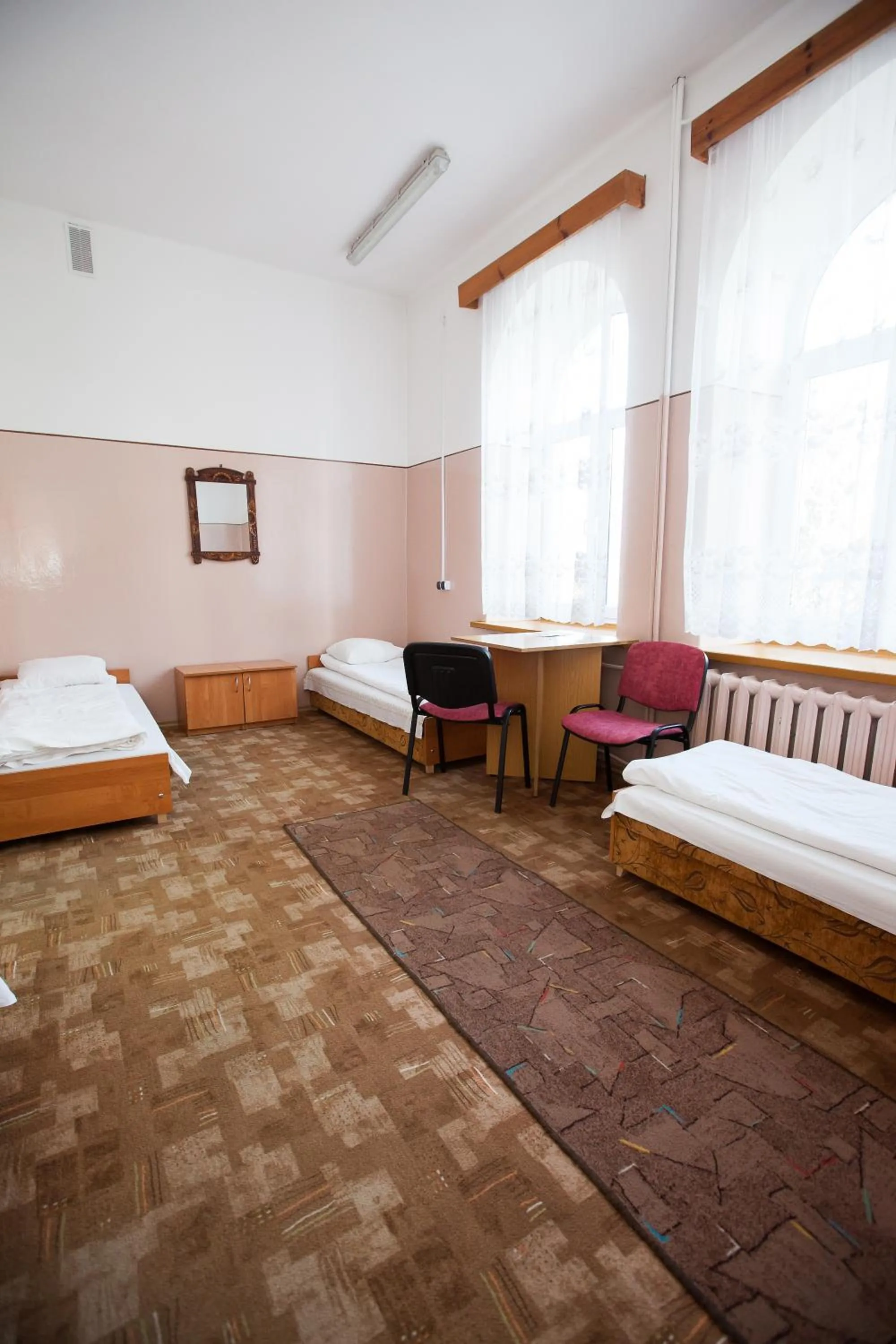 Photo of the whole room, Bed in Schronisko Młodzieżowe PTSM Matecznik