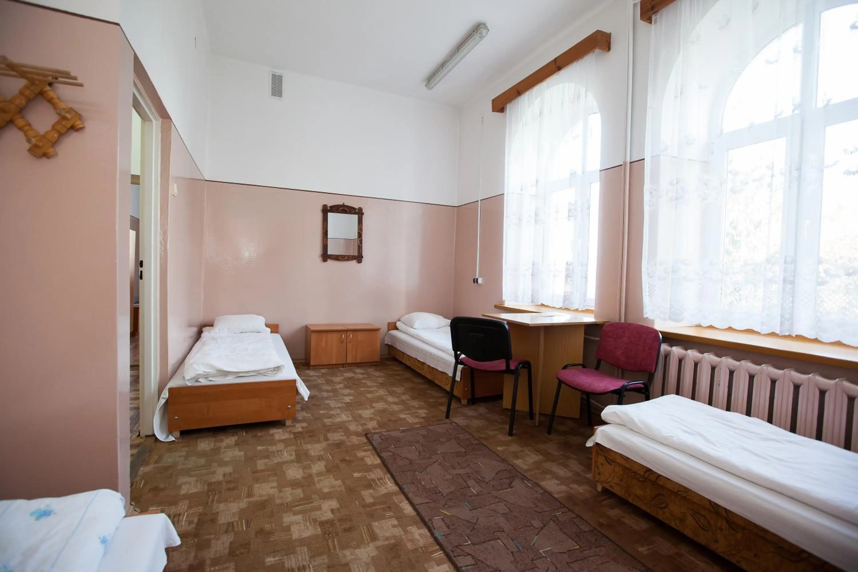 Photo of the whole room, Bed in Schronisko Młodzieżowe PTSM Matecznik