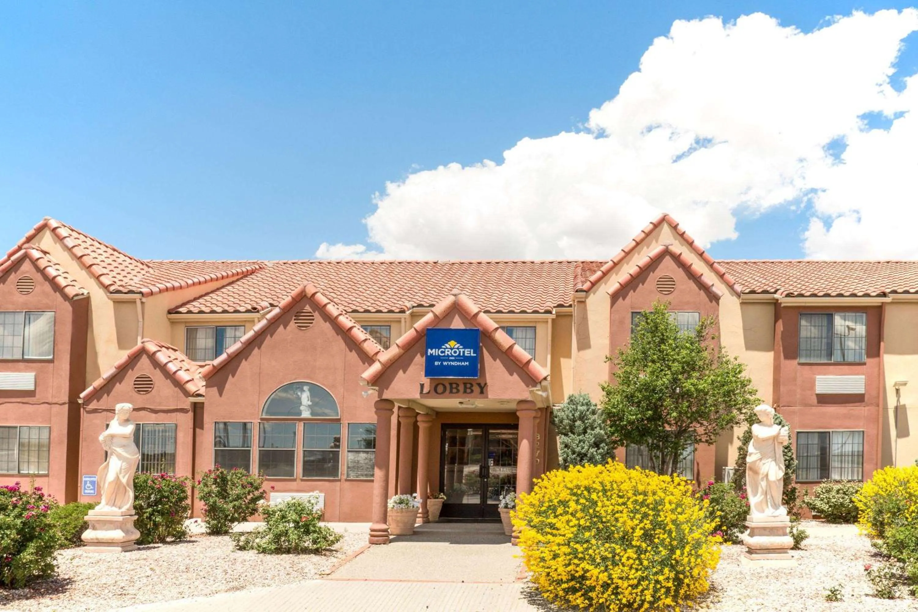 Property building in Microtel Inn & Suites by Wyndham Gallup - PET FRIENDLY
