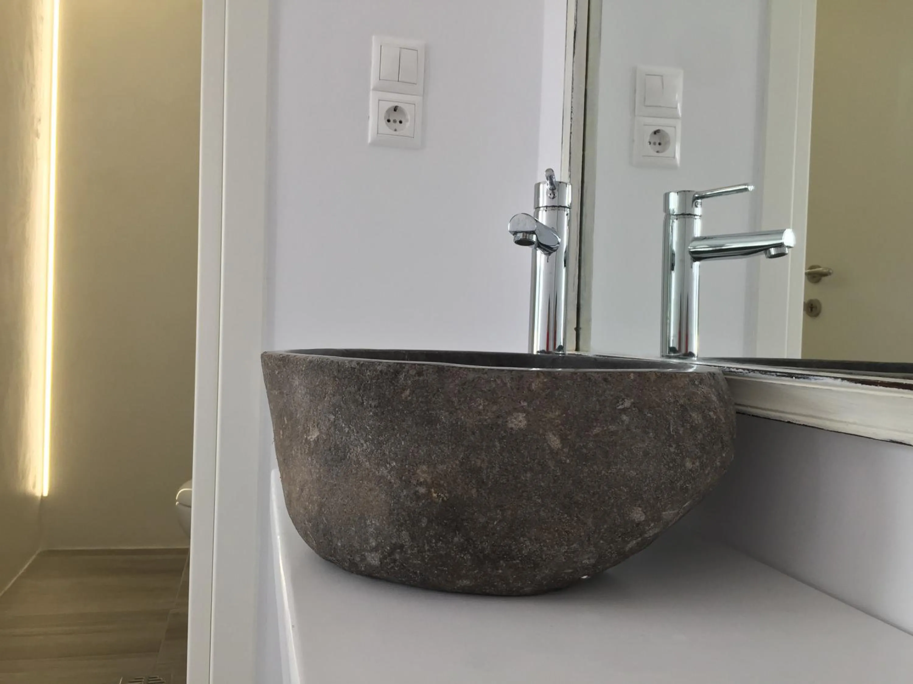 Bathroom in Gigi Rooms