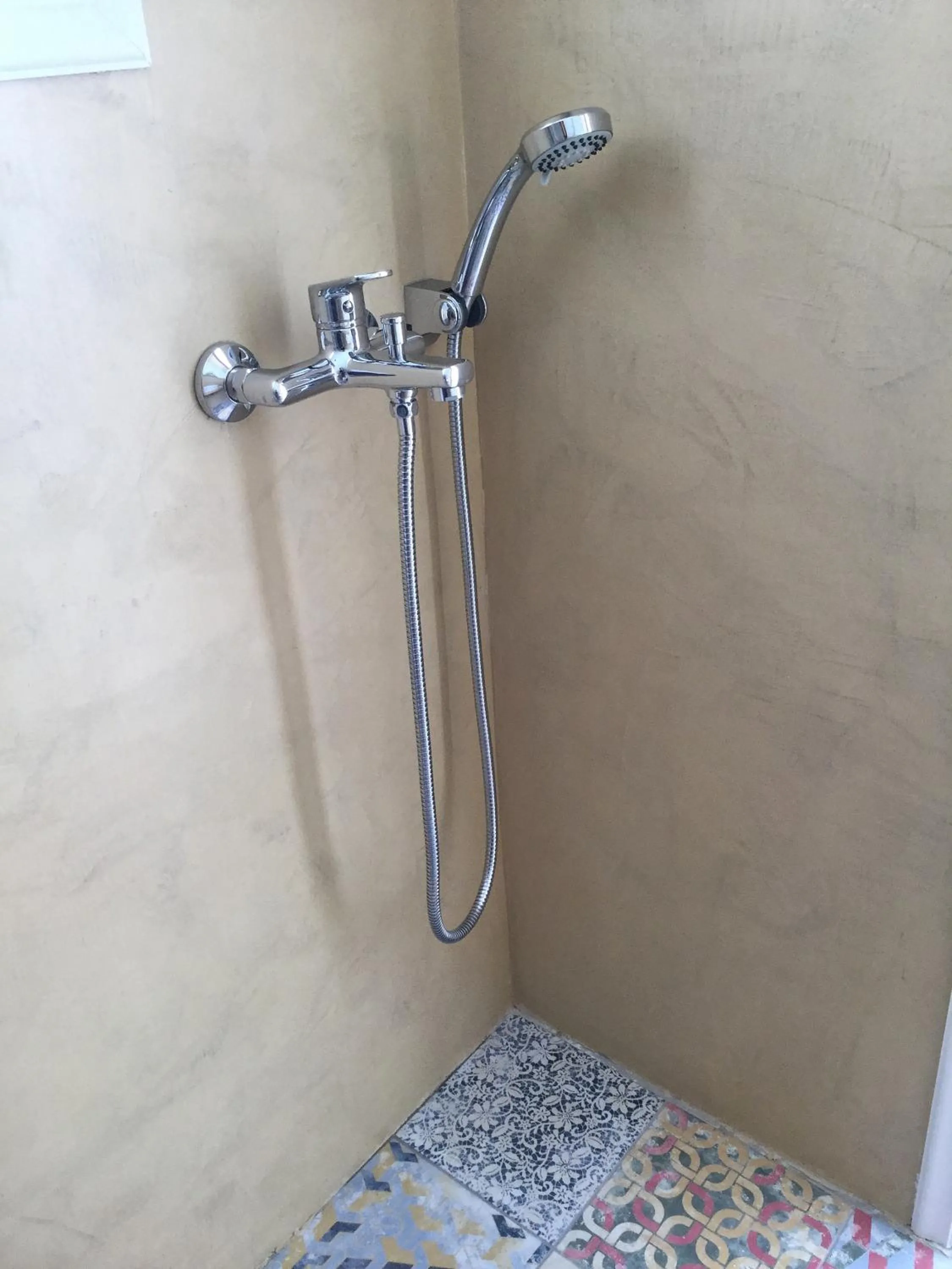 Shower in Gigi Rooms