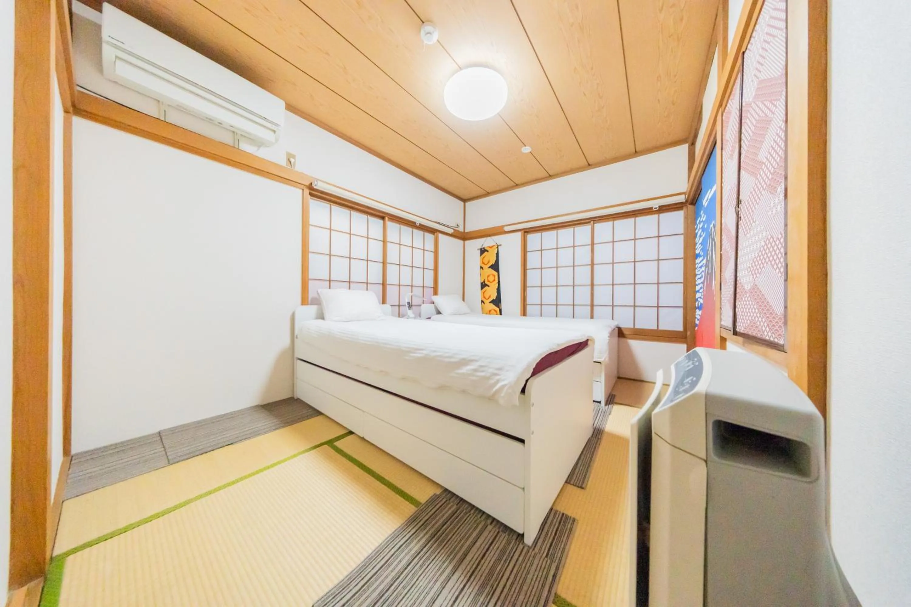 Bed in Ikebukuro no Yado detached house