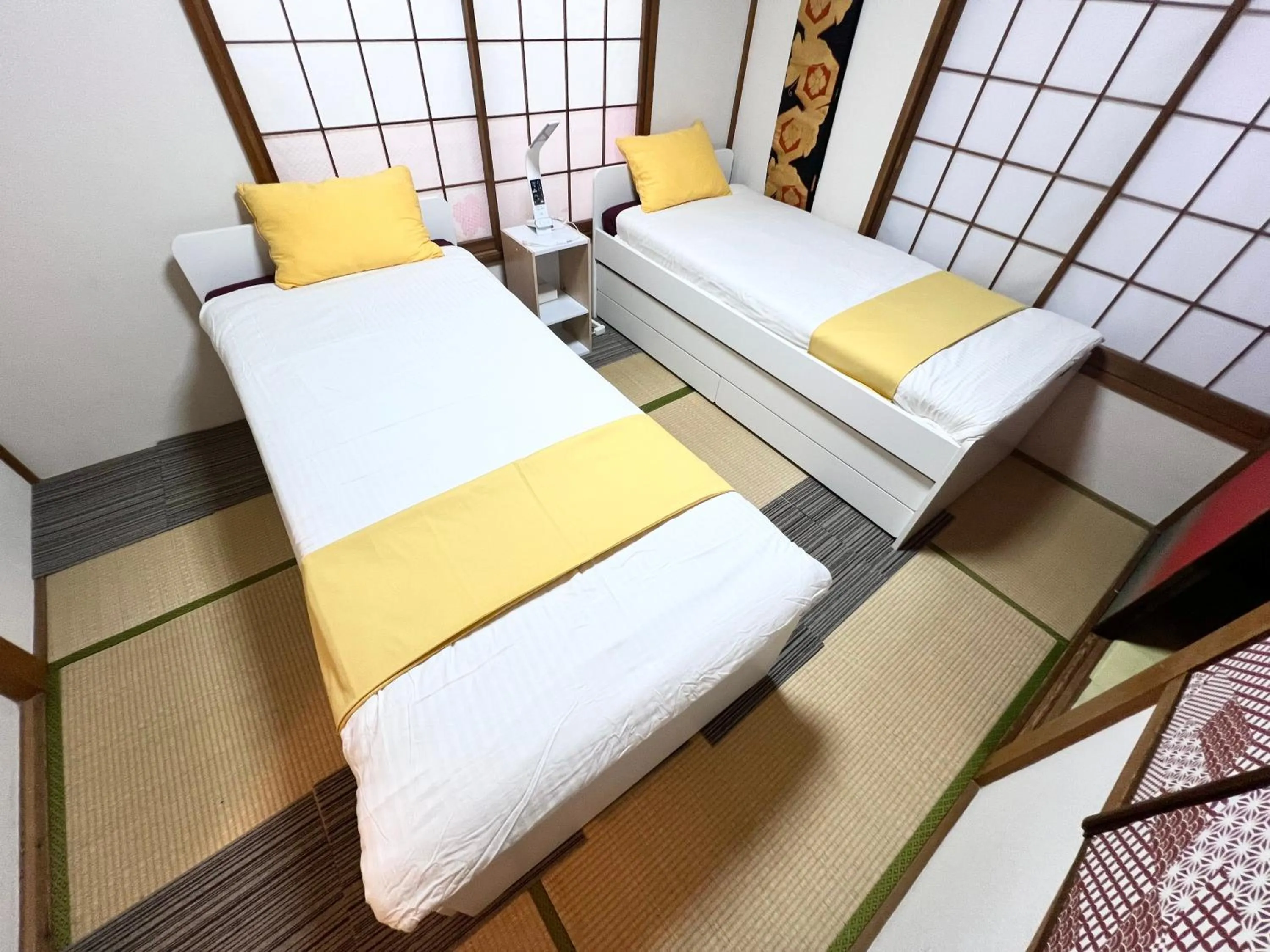 Bed in Ikebukuro no Yado detached house