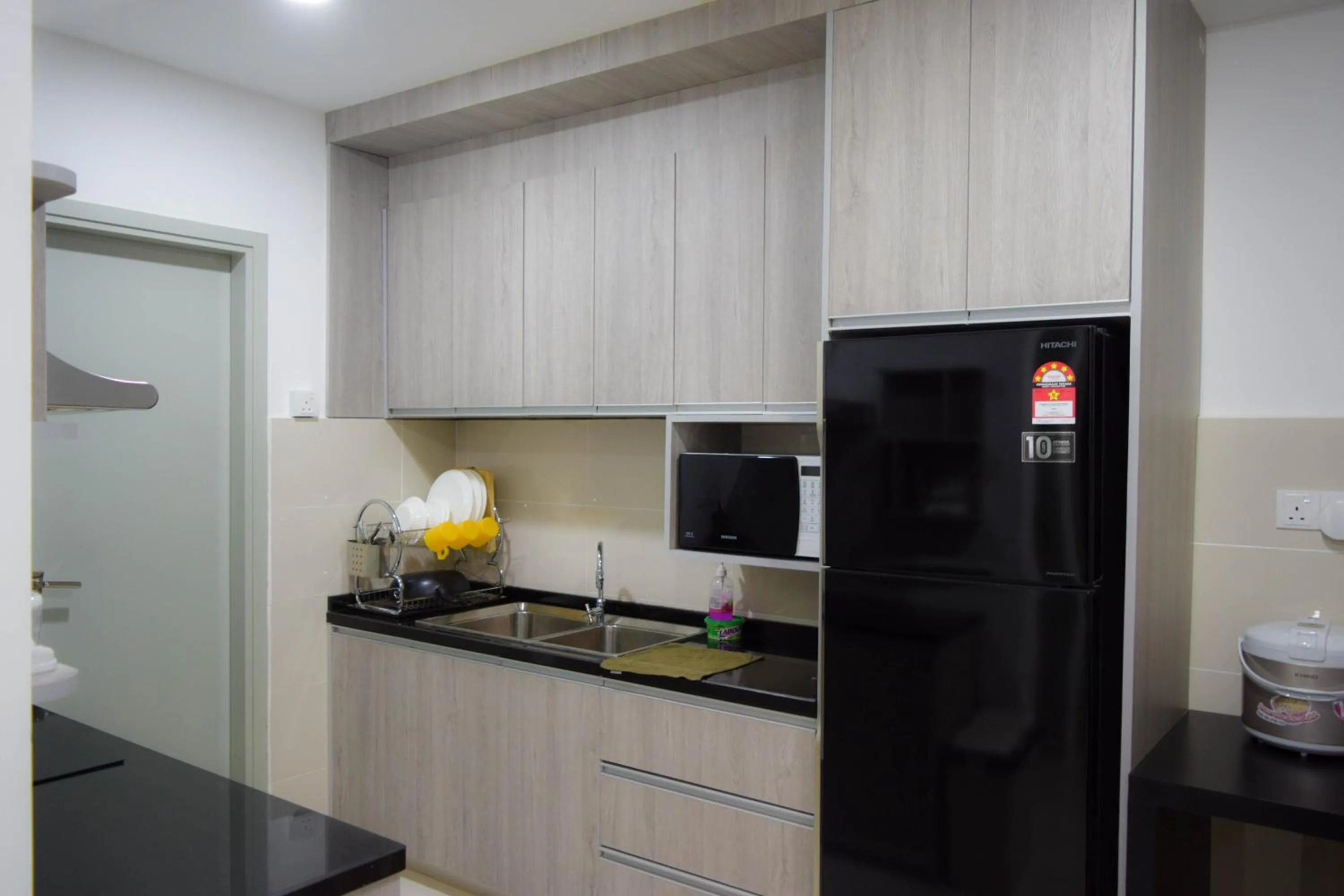 Kitchen or kitchenette in Sutera Avenue by Alawa Homes Kota Kinabalu