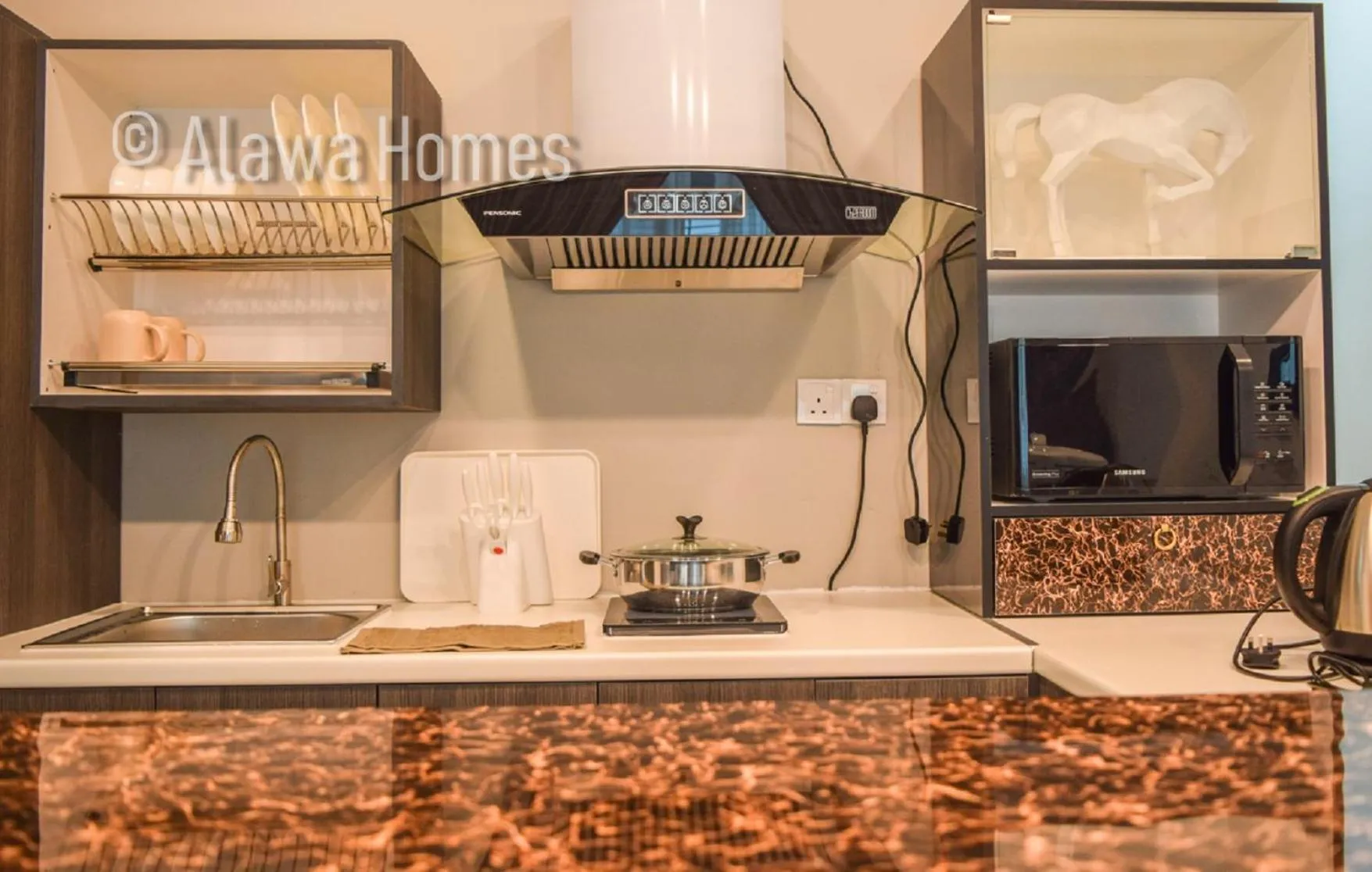 Kitchen or kitchenette in Sutera Avenue by Alawa Homes Kota Kinabalu