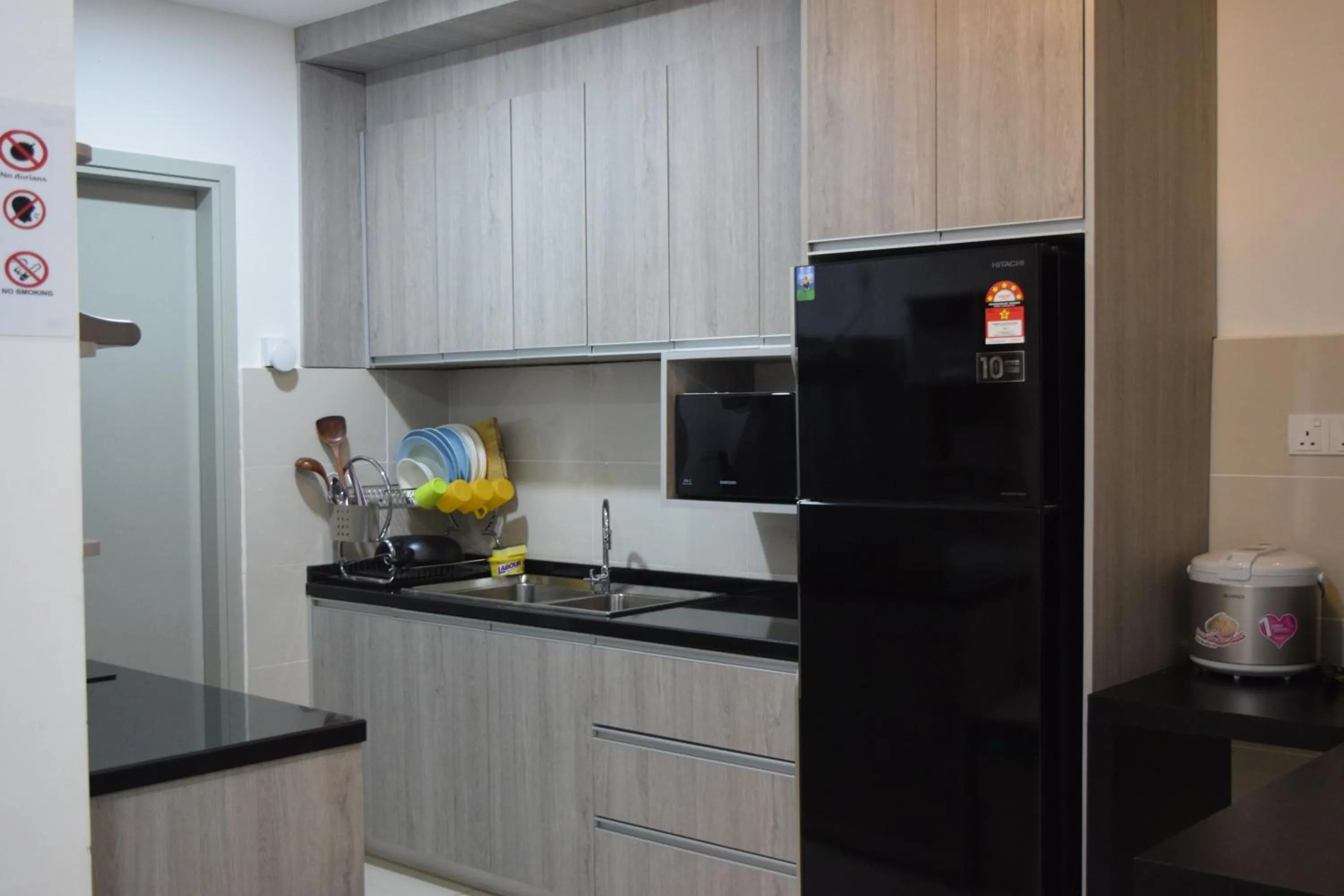 Kitchen or kitchenette in Sutera Avenue by Alawa Homes Kota Kinabalu