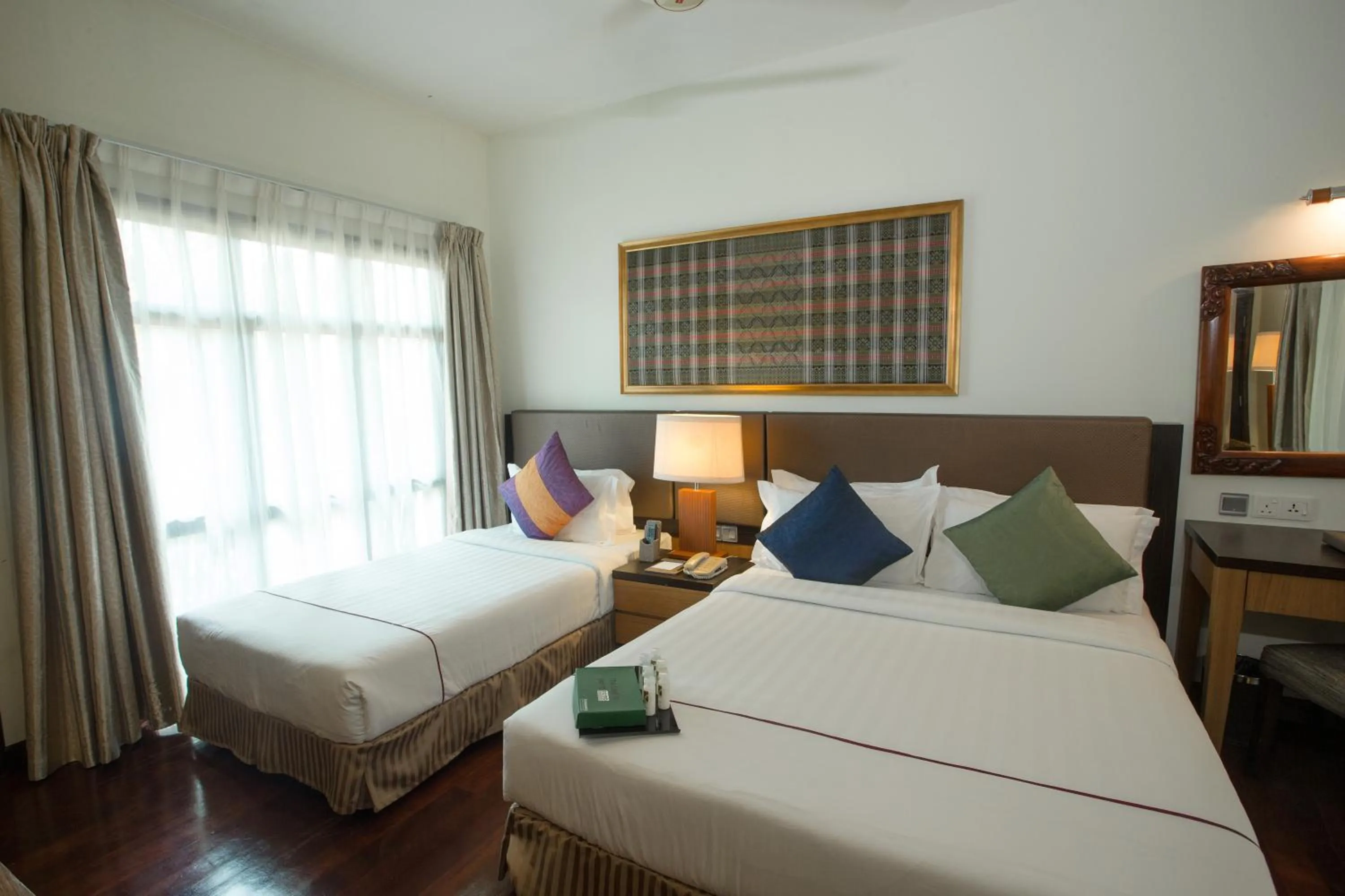 Photo of the whole room, Bed in Tunamaya Beach & Spa Resort Tioman Island