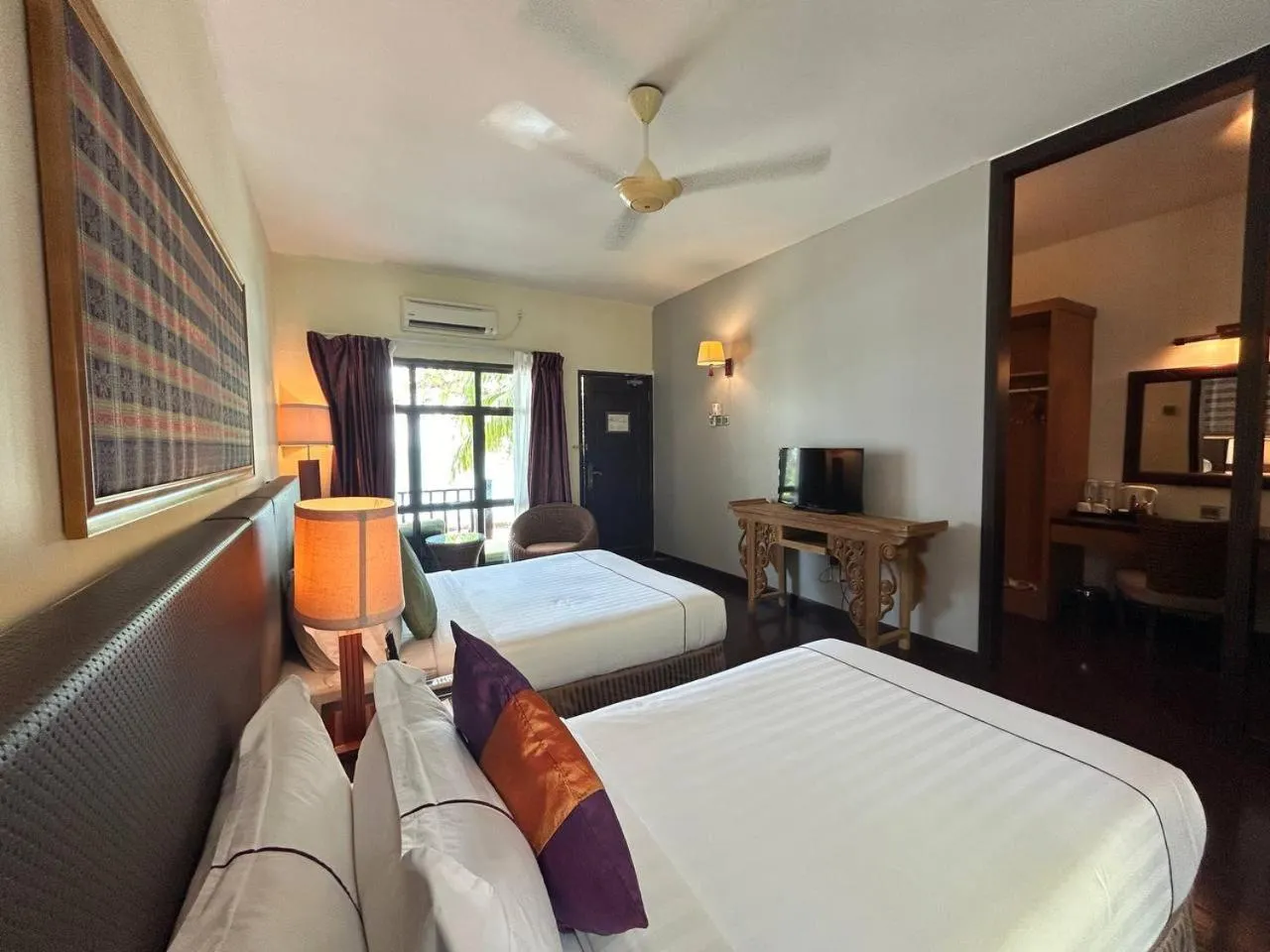Photo of the whole room, Bed in Tunamaya Beach & Spa Resort Tioman Island
