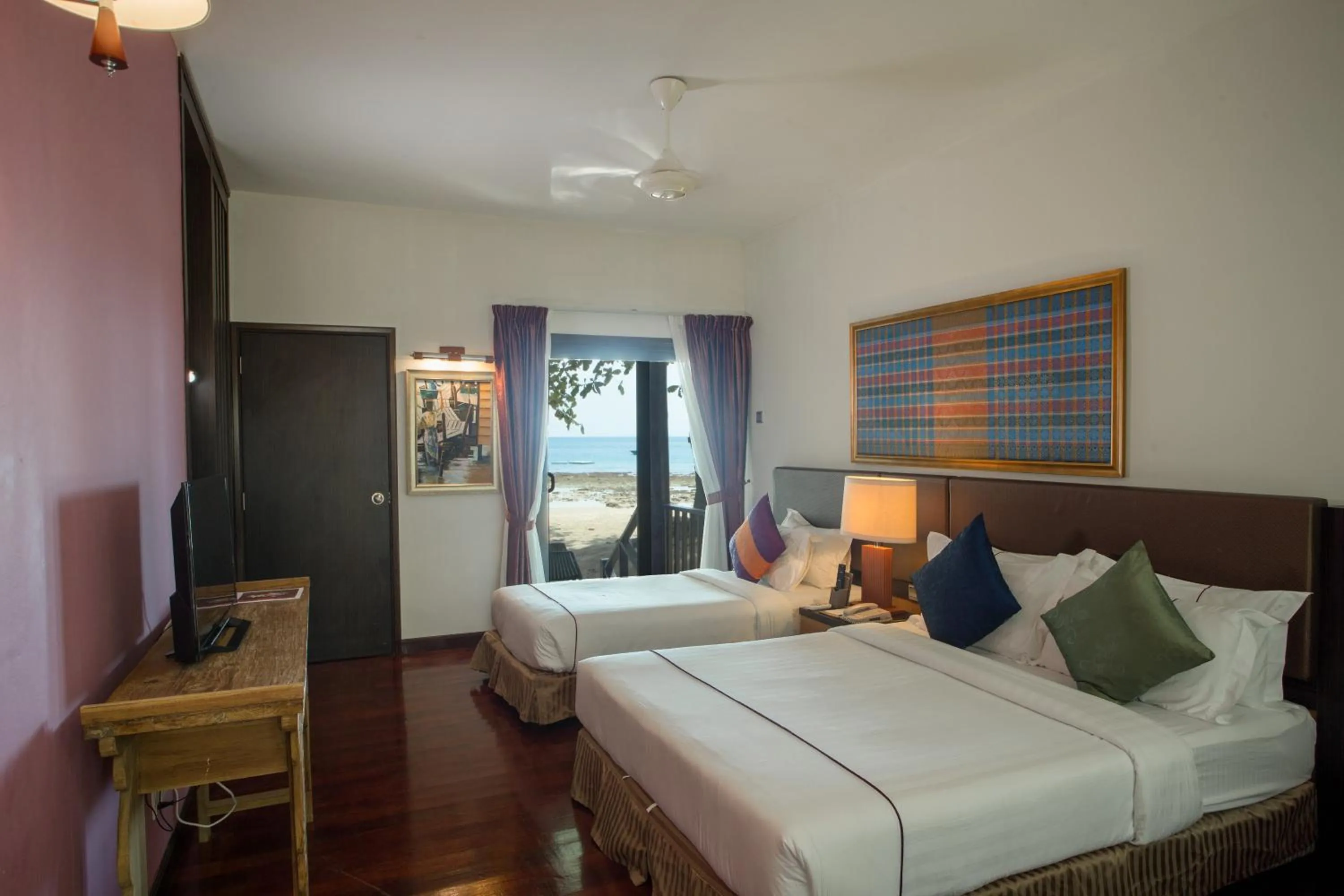 Photo of the whole room, Bed in Tunamaya Beach & Spa Resort Tioman Island
