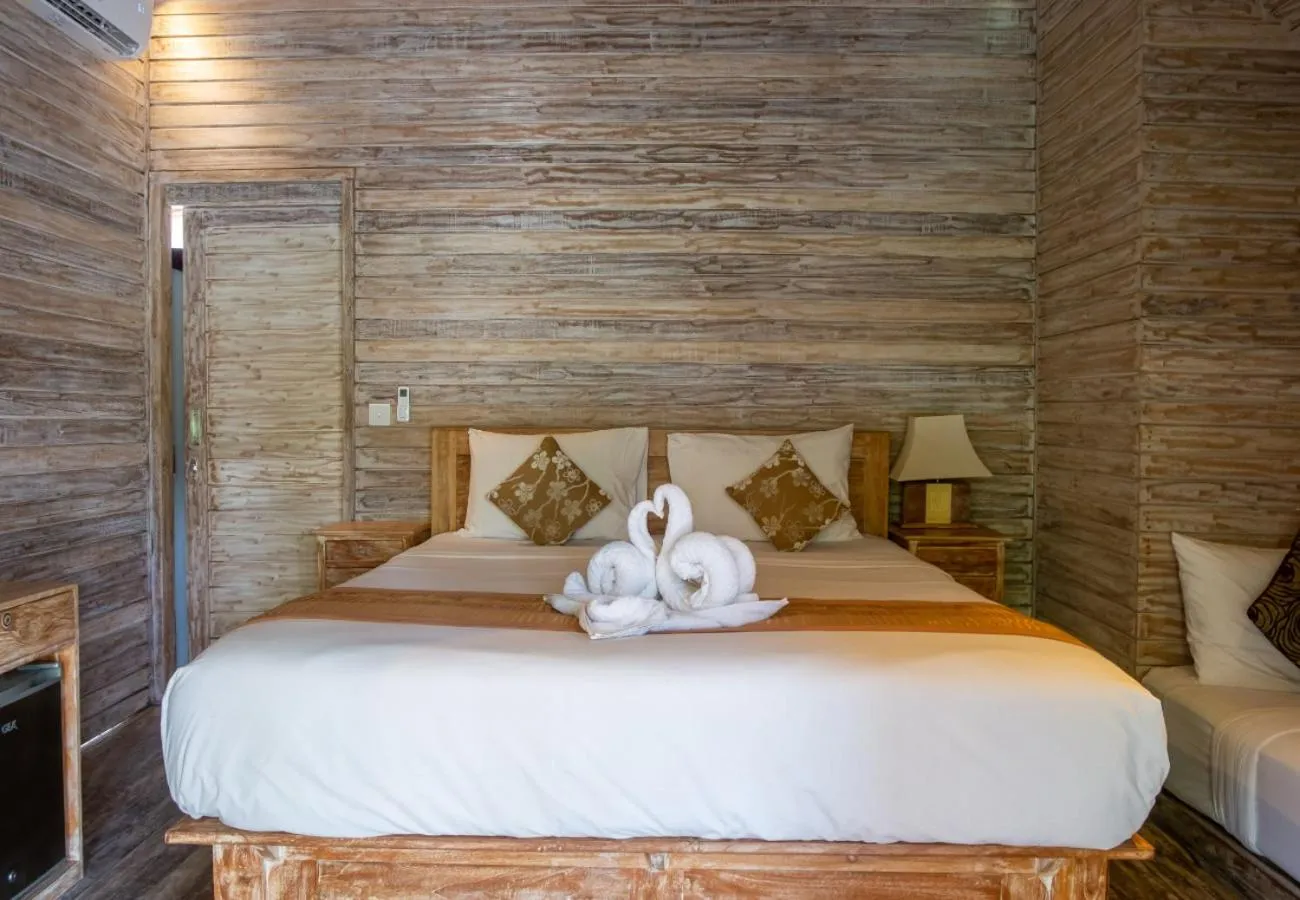 Bed in The Nichos Bungalows And Villas