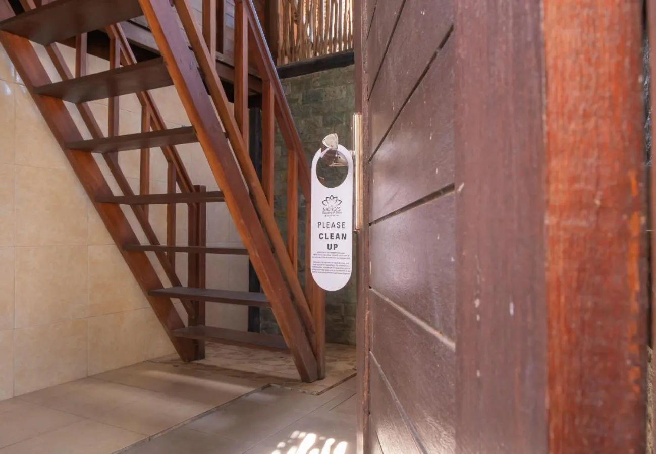 Property logo or sign in The Nichos Bungalows And Villas