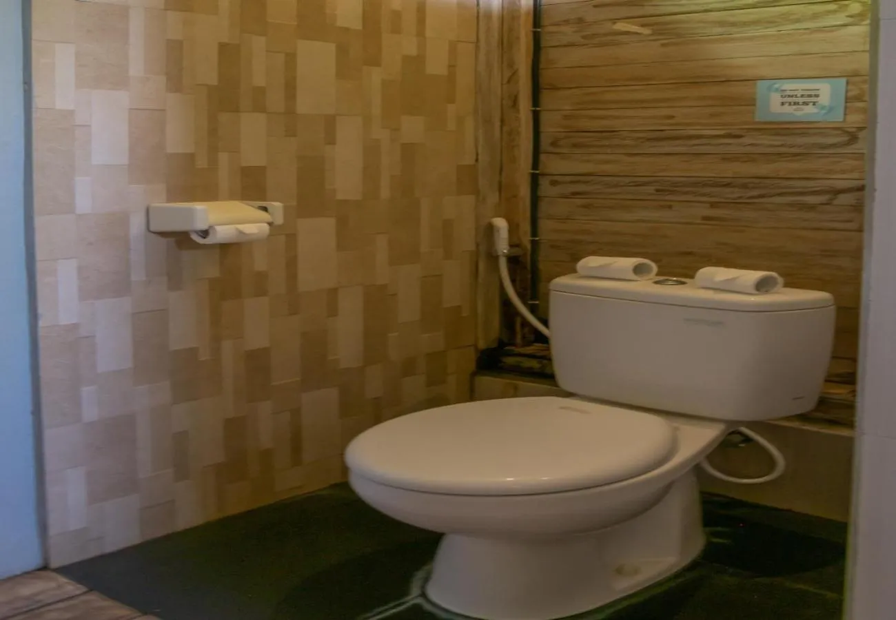 Toilet in The Nichos Bungalows And Villas