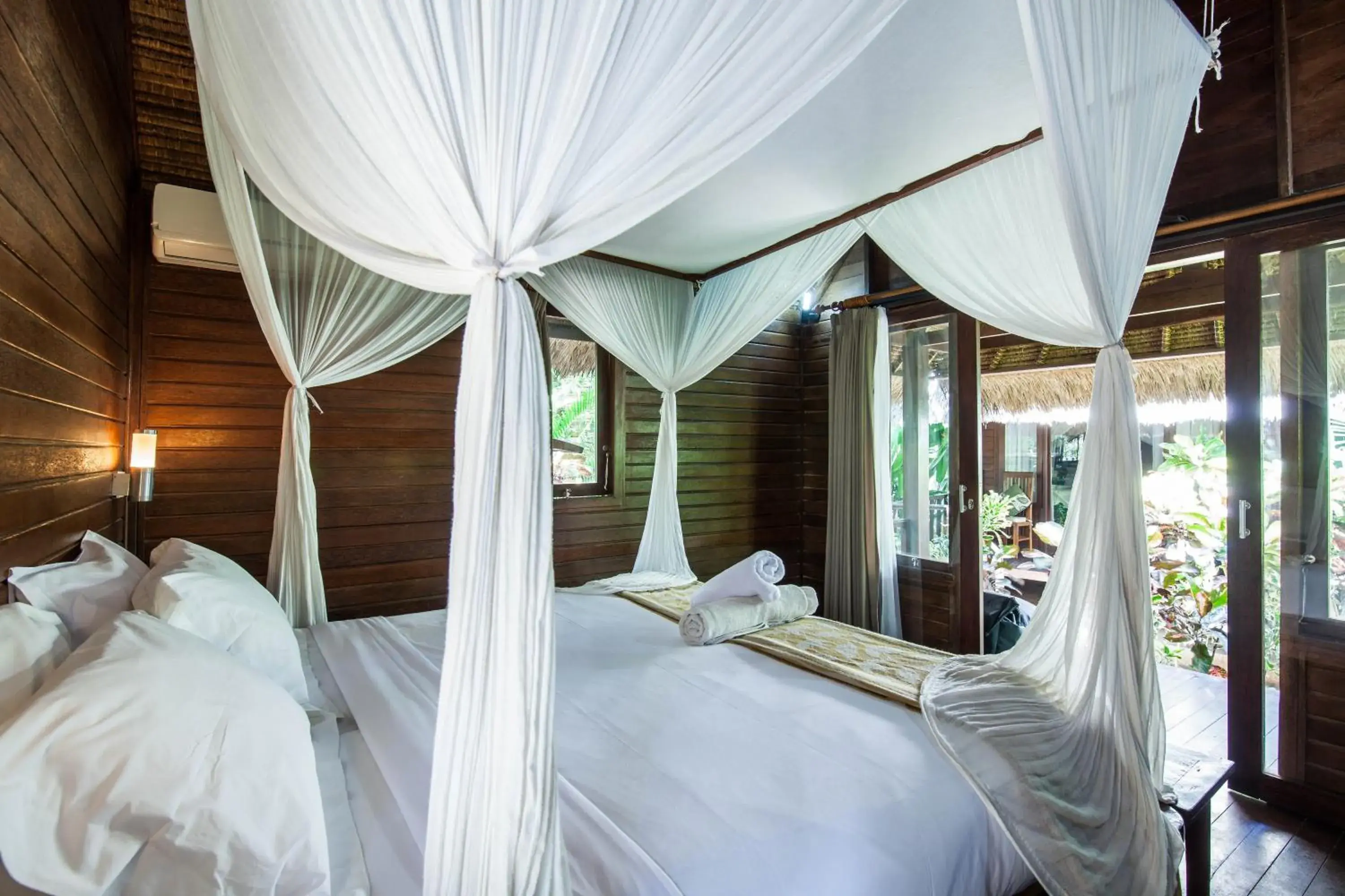 Bed in The Nichos Bungalows And Villas Bed in The Nichos Bungalows And Villas