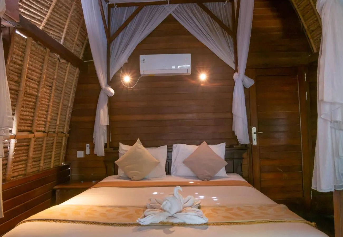 Bed in The Nichos Bungalows And Villas