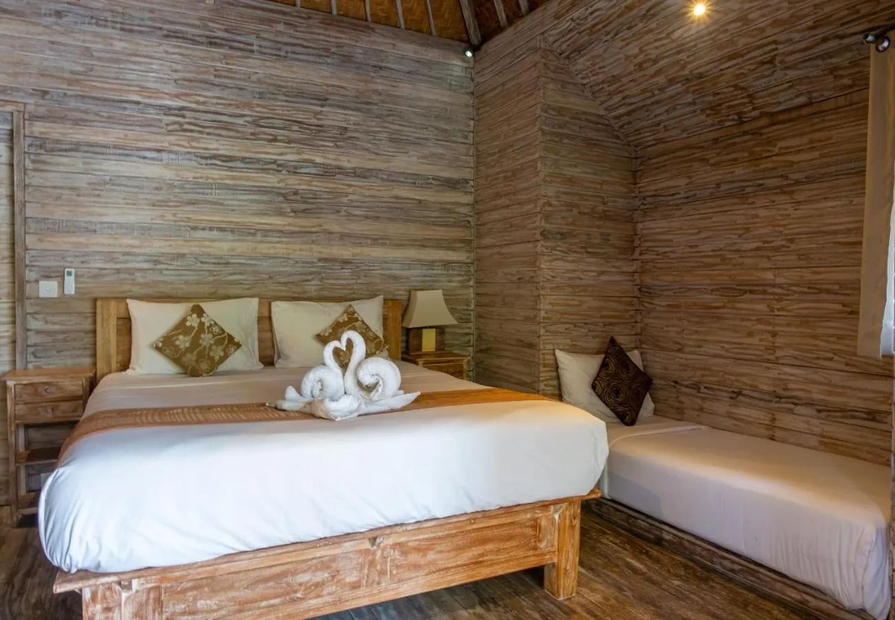 Bed in The Nichos Bungalows And Villas