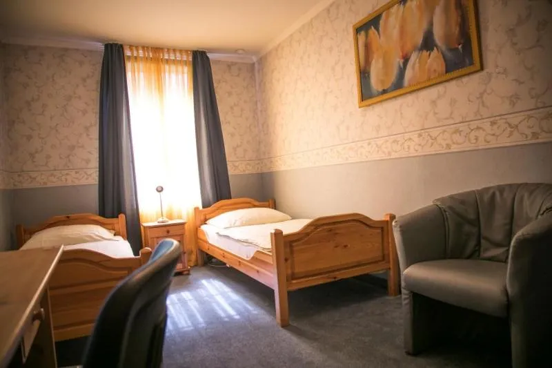 Bed in Hotel Am Rathaus