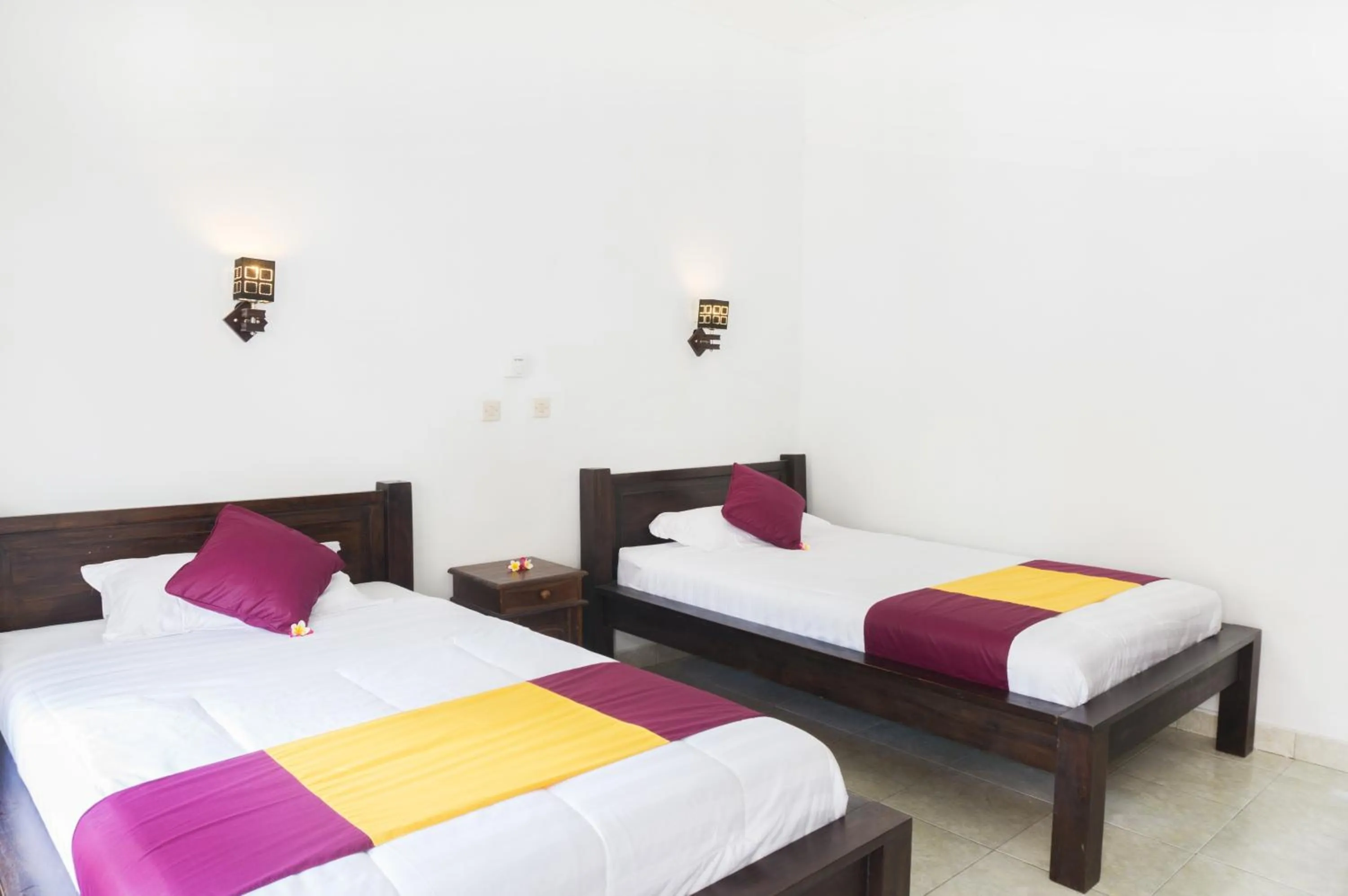 Photo of the whole room, Bed in Nusa Indah Bungalow