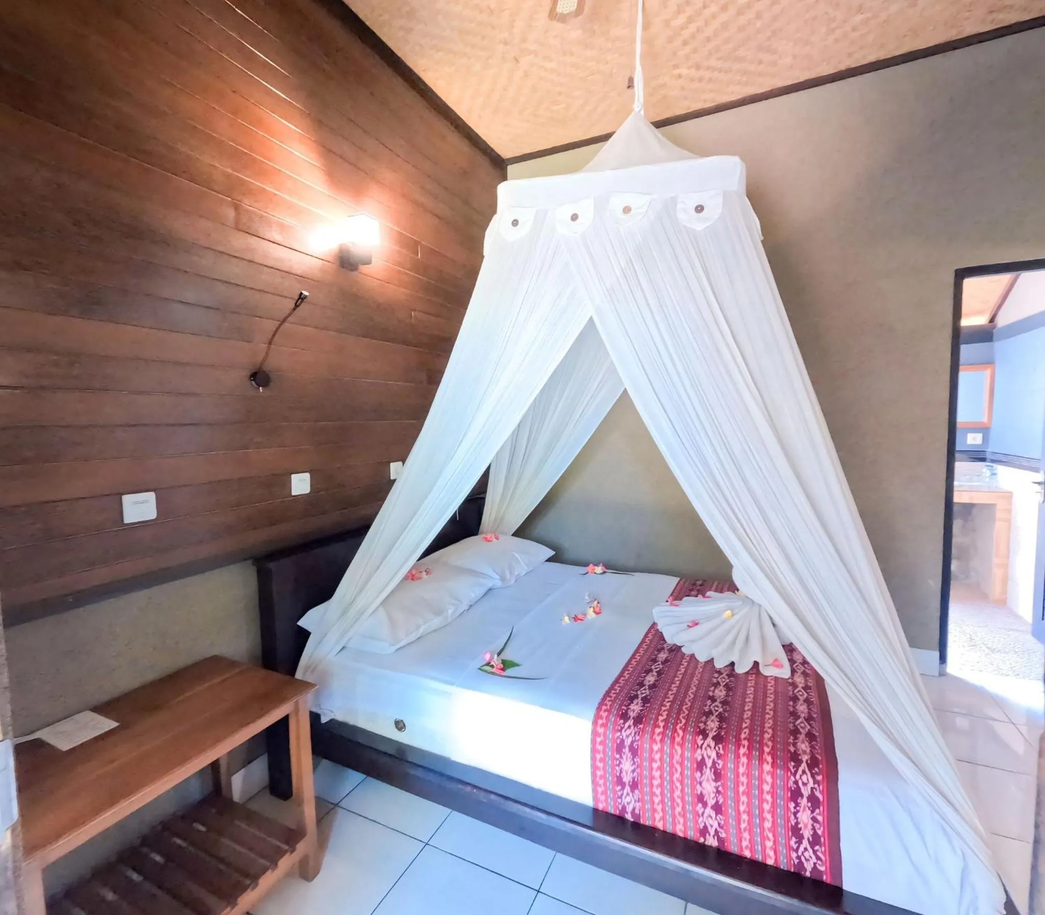 Bed in Suka Sari Cottages