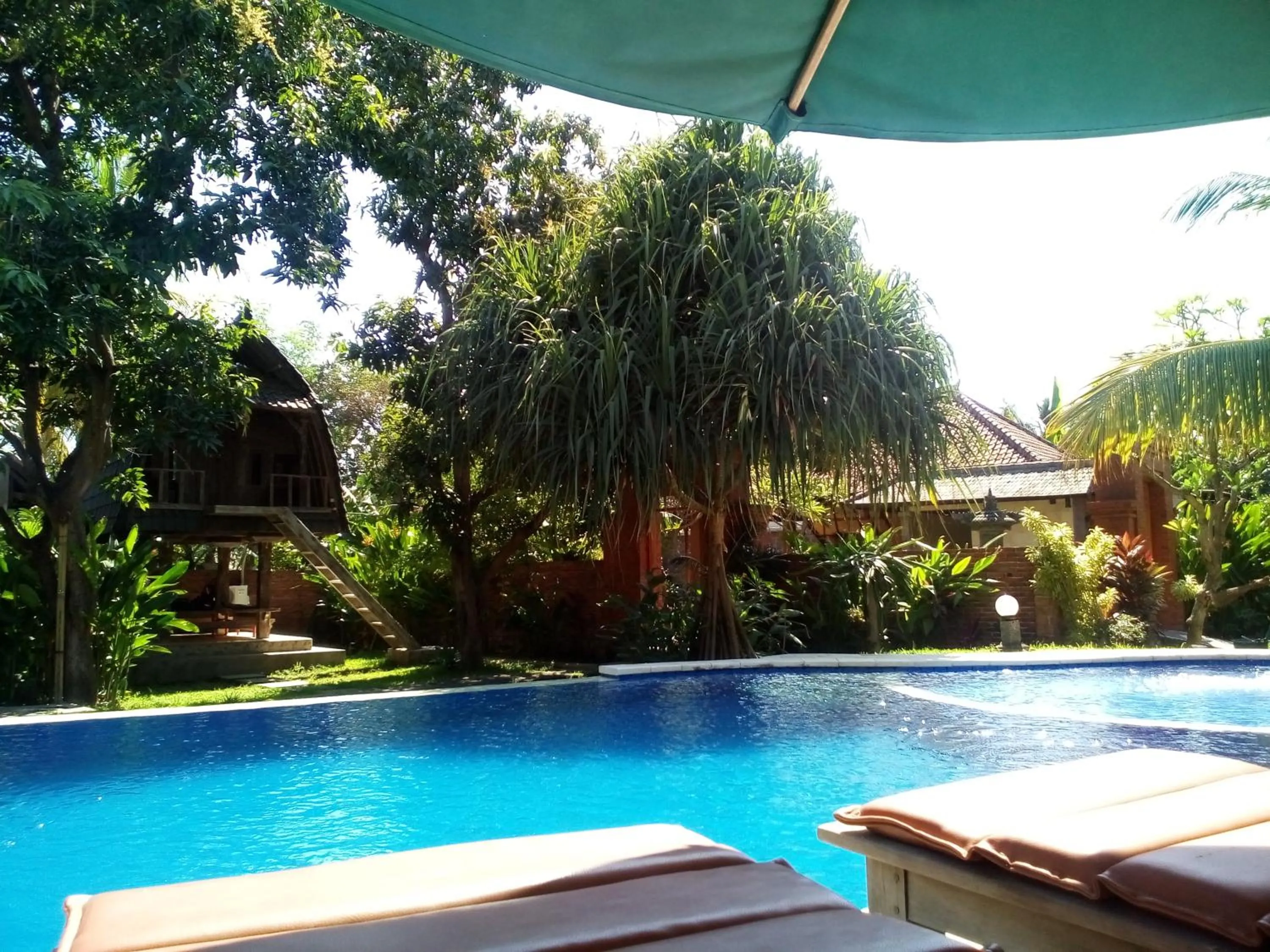 Swimming pool in Suka Sari Cottages