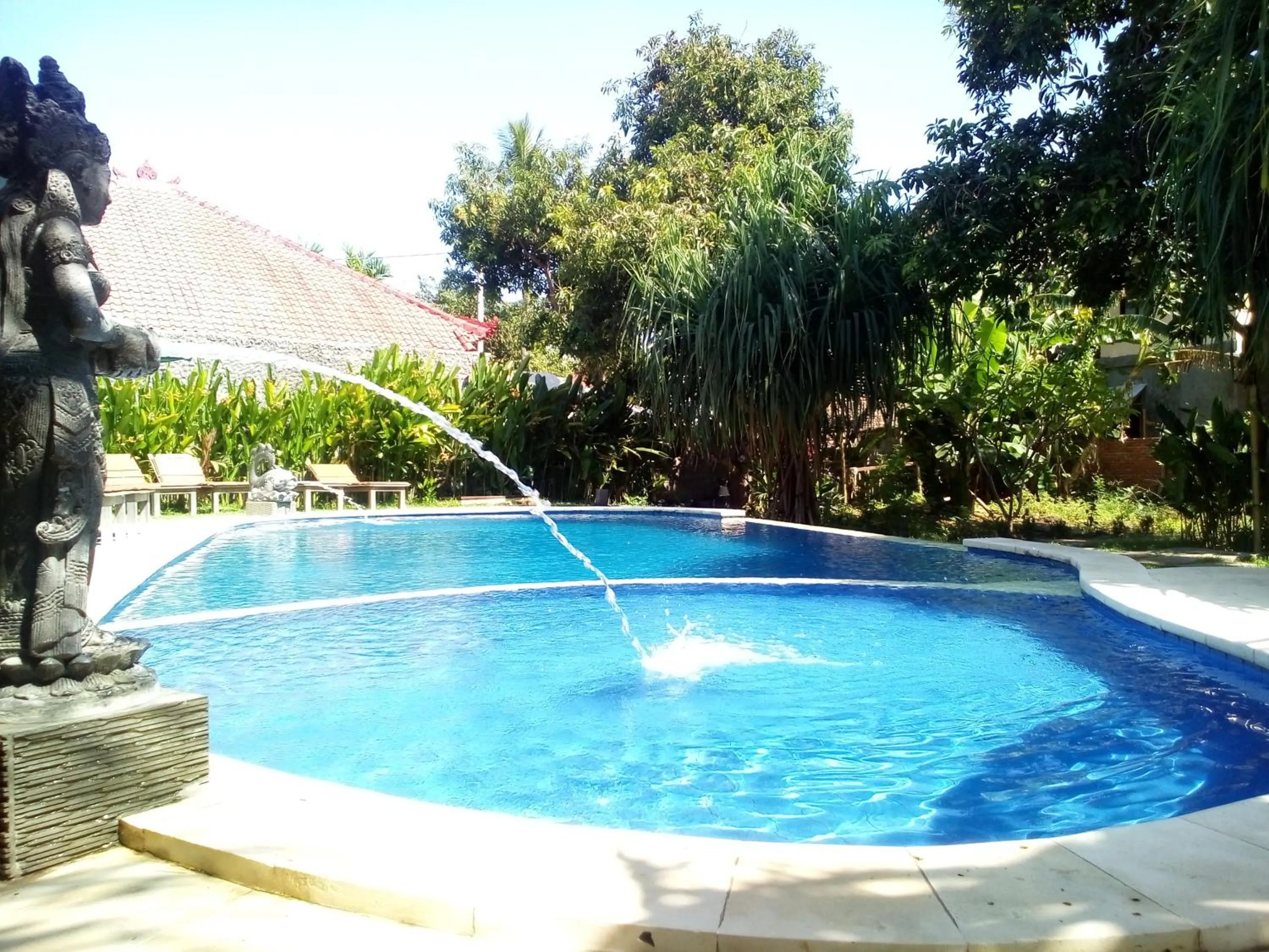 Swimming pool in Suka Sari Cottages