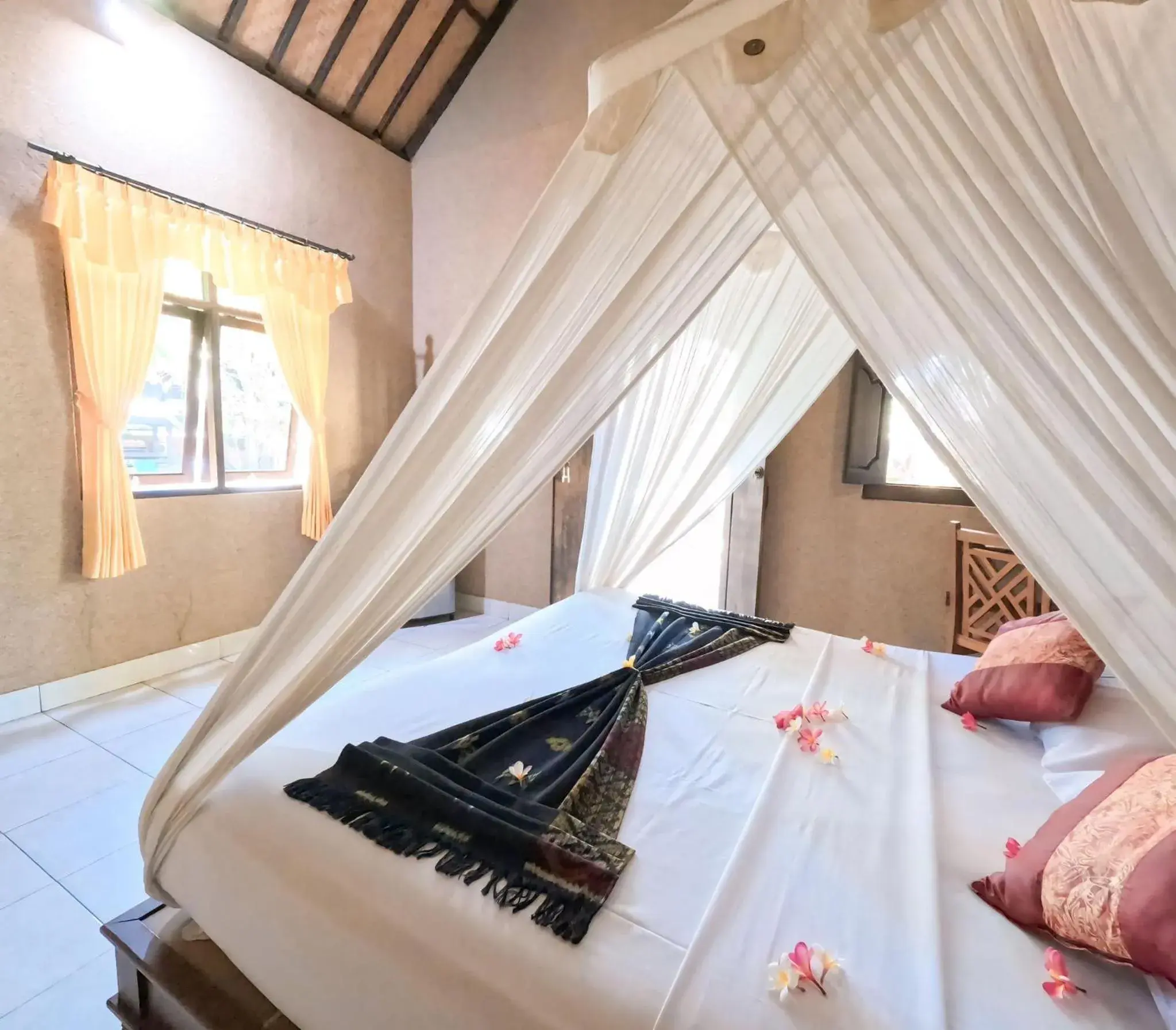 Grand Deluxe Double Room in Suka Sari Cottages Grand Deluxe Double Room in Suka Sari Cottages