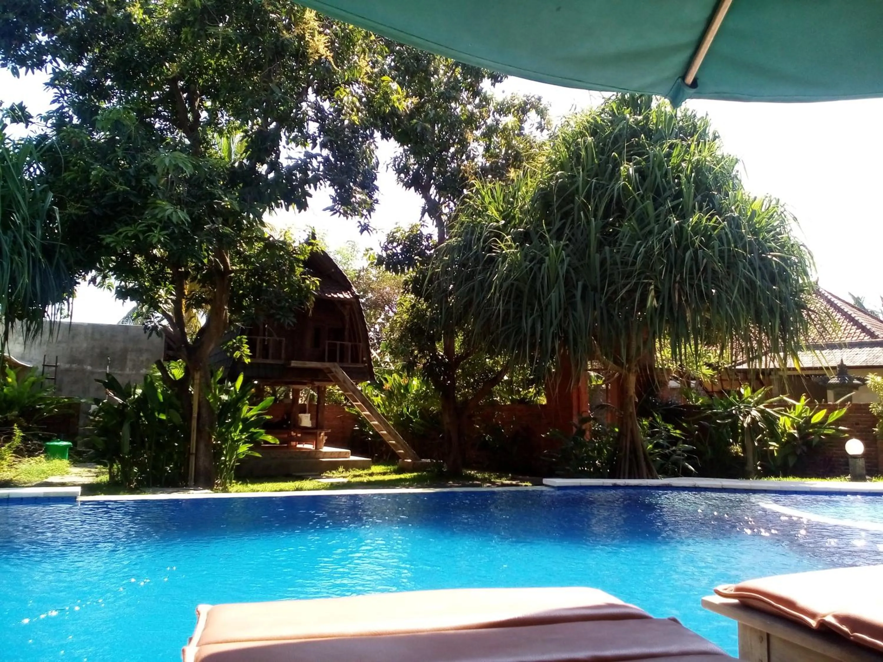 Swimming pool in Suka Sari Cottages