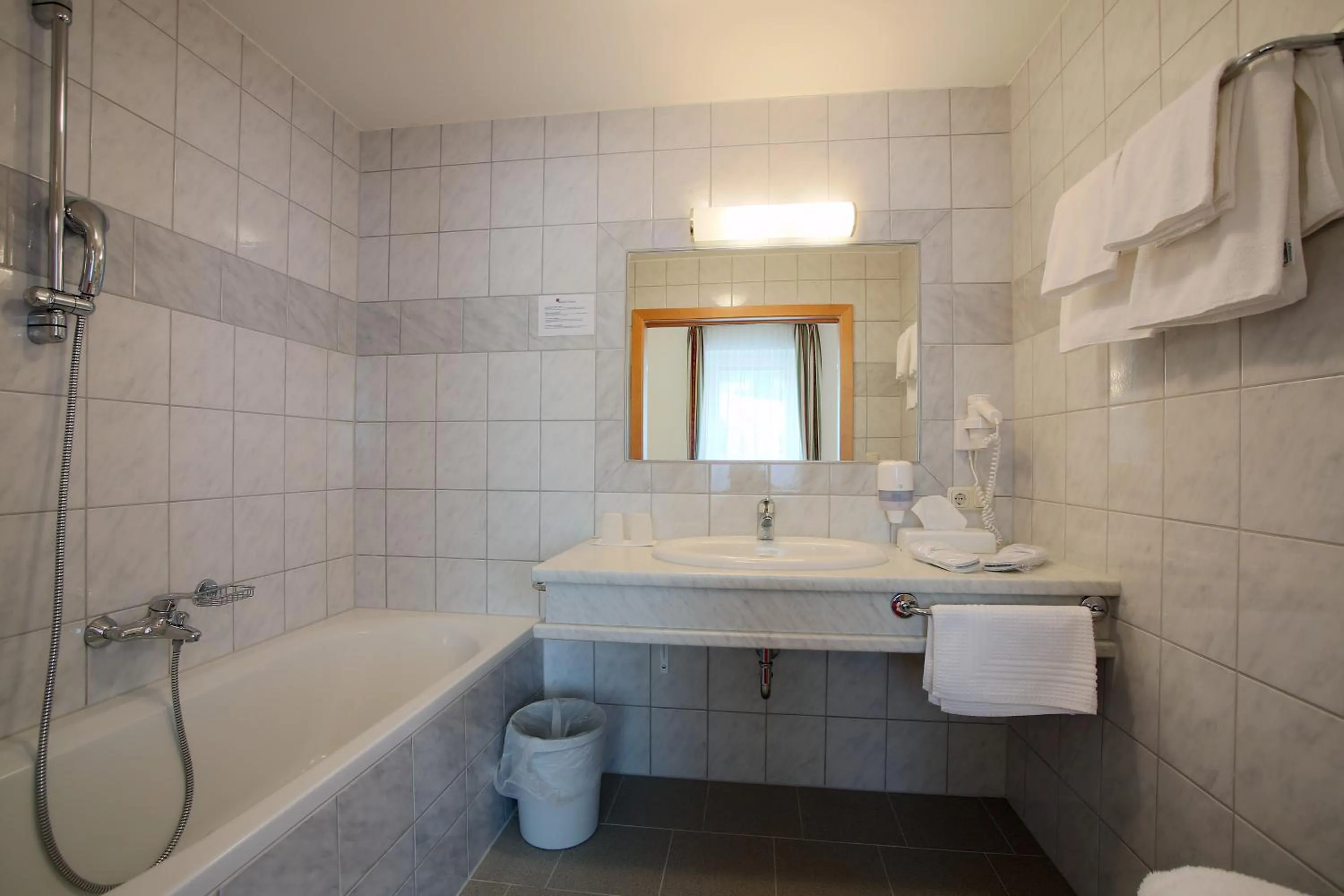 Bathroom in AKTIVHOTEL Weisser Hirsch