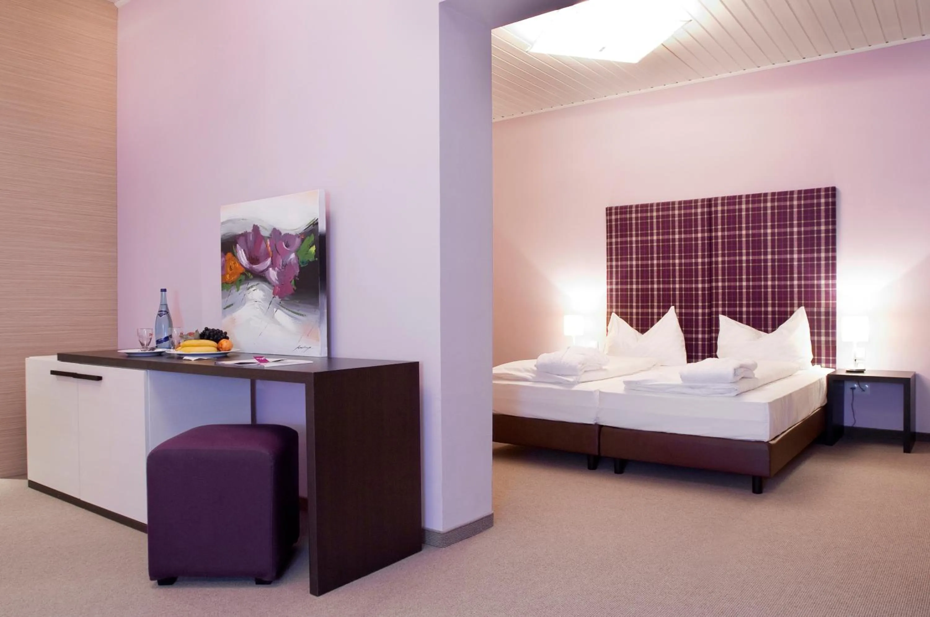 Bed in AKTIVHOTEL Weisser Hirsch