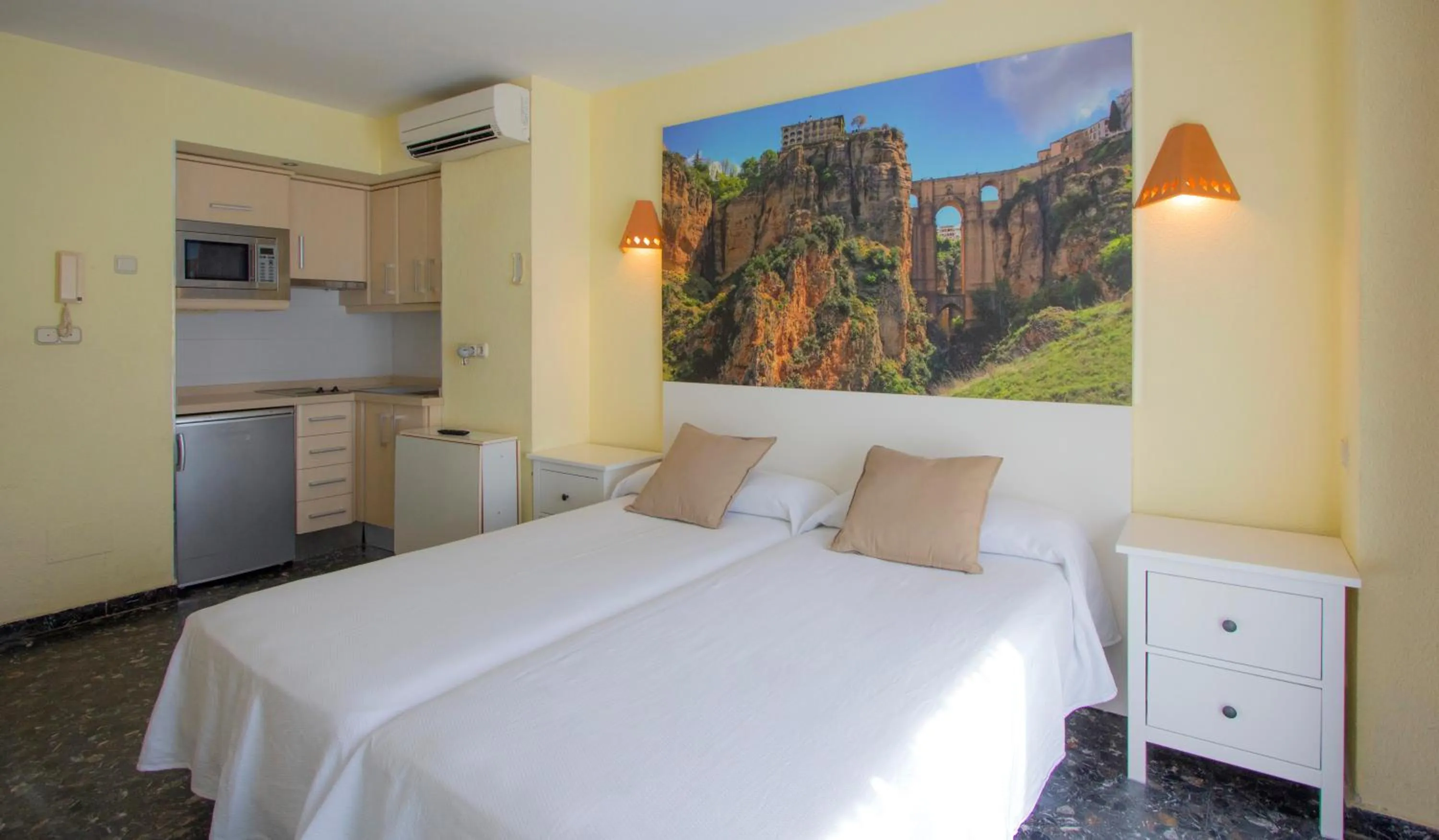 Kitchen or kitchenette, Bed in Playa Miguel Beach Club