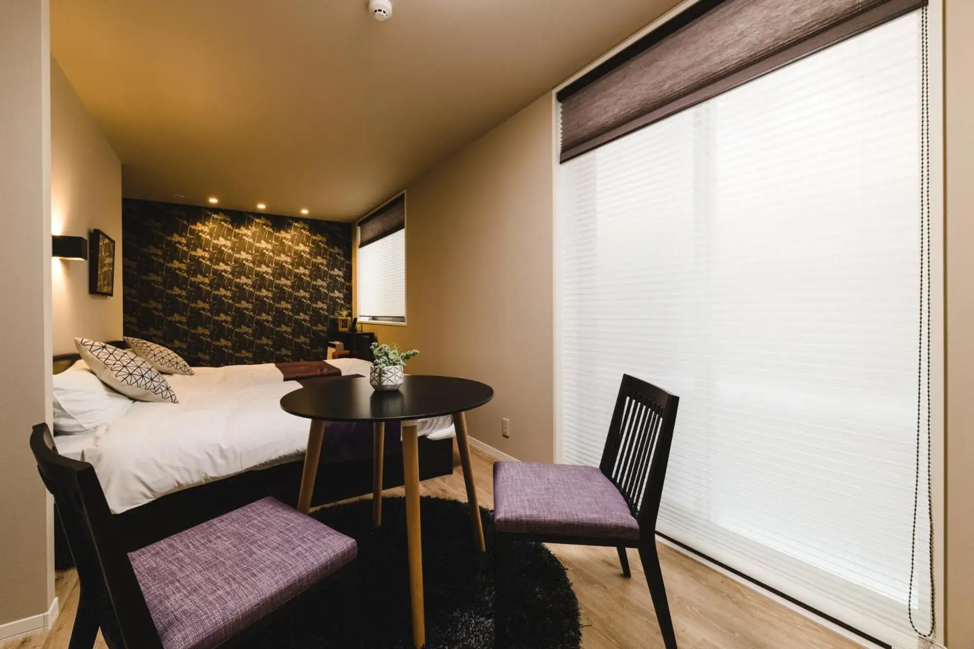 Living room, Bed in Trip Base HAKATAEKIMAE Living room, Bed in Trip Base HAKATAEKIMAE