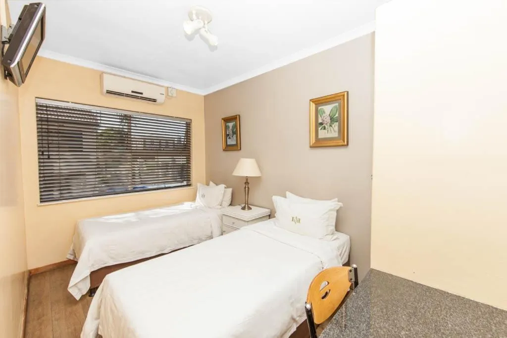 TV and multimedia, Bed in Vetho 1 Apartments OR Tambo Airport